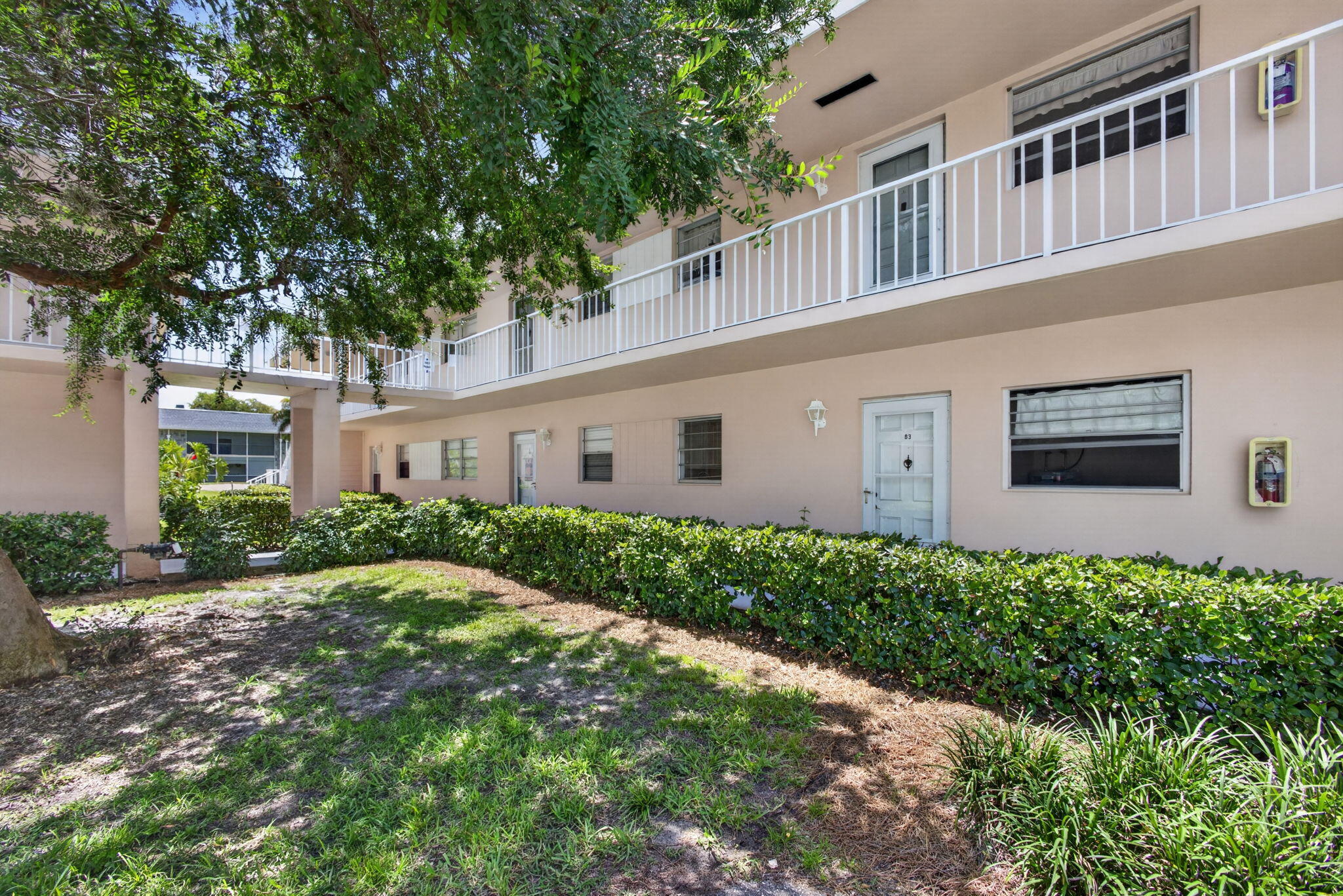 Welcome to this well-maintained one-bedroom, one-bathroom ground-floor condominium located in the desirable Little Club community. This inviting residence is freshly painted and features a spacious walk-in shower, stainless steel appliances, a newer a/c system, and an updated electrical panel for added peace of mind. Enjoy relaxing outdoor living on the screened patio, which includes two convenient walk-in storage closets. Nestled adjacent to Jonathan Dickinson State Park, this home offers direct access to tranquil nature trails and scenic surroundings right outside your door. Little Club is an active 55+ community offering an exceptional lifestyle with a 9-hole golf course, tennis courts, pickleball, bocce, a swimming pool, clubhouse, and a variety of social activities and amenities.  Experience comfortable, low maintenance living in a peaceful setting with abundant recreational opportunities.