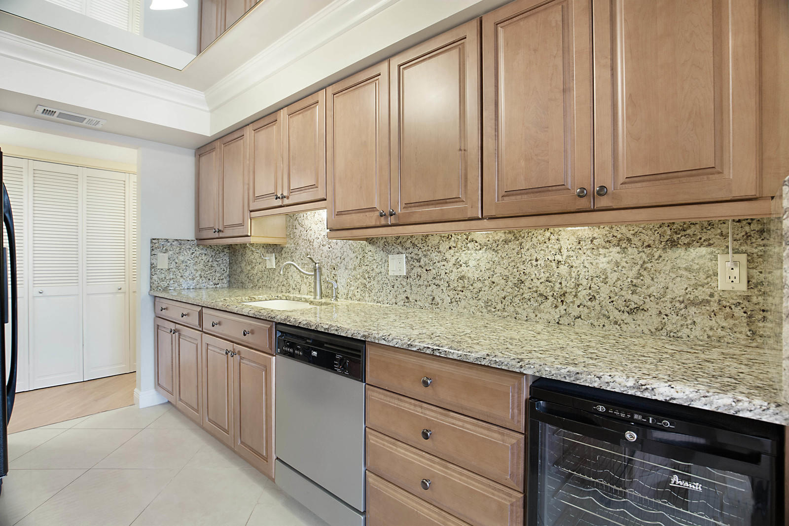 Spacious 2-bedroom, 2-bath penthouse with a den available for lease beginning August 1, 2026. The den features a custom-built office complete with a desk and cabinetry, making it an ideal work-from-home space. The oversized primary suite offers abundant closet space and a spacious en-suite bathroom with a separate shower and Roman tub. Residents of Porta Bella South enjoy an exceptional amenity package, including tennis and pickleball courts, a fitness center, resort-style pool overlooking the marina, kayak and paddle-board storage, floating Jet Ski docks, and boating accommodations available to **owners only** at just $2.25 per foot. Conveniently located in a premier waterfront community, this penthouse offers the perfect blend of comfort, convenience, and resort-style living.