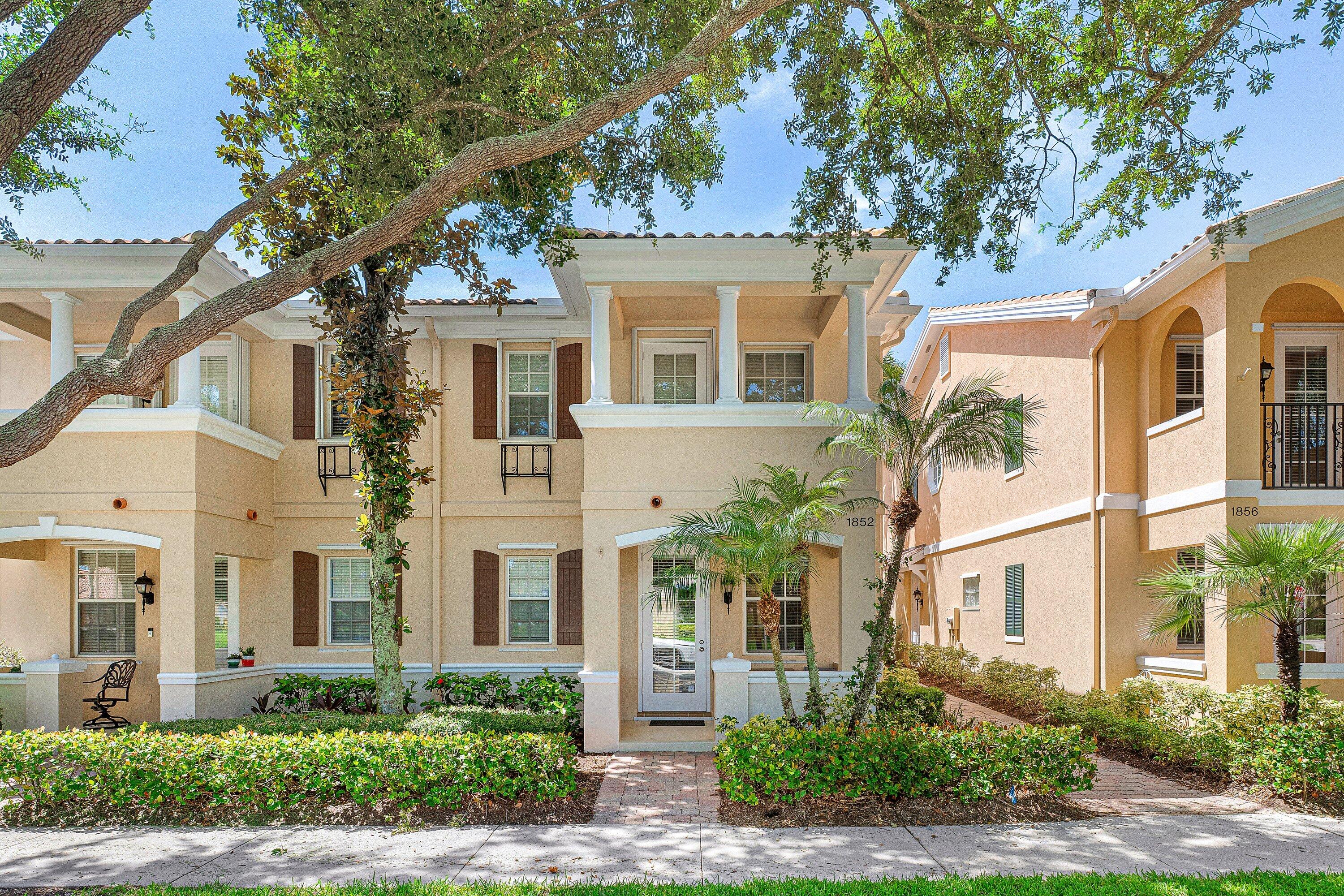 MUST SEE! Immaculate 4 bedroom, 3 bath townhome nestled in Tuscany at Abacoa, in the heart of Jupiter. This bright two story residence lives like a single family home, offering over 1,800 square feet of living space, a spacious private screened patio, and 2 car garage with an extended decorative driveway. Perfectly situated in a vibrant sought after neighborhood, across from lush open green space. The light filled open floor plan features high ceilings, neutral tile flooring, and a versatile first floor guest bedroom with a full bath - perfect for guests, home office, playroom, or more. The spacious kitchen with breakfast nook opens seamlessly to the great room, where stacking sliding glass doors create effortless indoor-outdoor Florida living.  Upstairs, the private primary suite is a true retreat, featuring a beautifully redesigned ensuite bath, custom fitted walk-in closet, and a covered balcony. Two additional guest bedrooms with bath and the conveniently located upstairs laundry complete the second level. Additional highlights include a 2024 A/C, fresh interior paint, covered front porch, screened patio, new pavers, and Divosta's solid CBS construction. Zoned for top-rated schools, and and a quick stroll to the community clubhouse, residents enjoy resort style amenities including a heated pool, fitness center, clubhouse, playground, scenic walking trails, and expansive green spaces. The community clubhouse features a community room and state of the art fitness center. Enjoy the Abacoa lifestyle with an easy stroll over to the Abacoa Town Center and Amphitheater featuring concerts, events, shops, restaurants, and Roger Dean Stadium, the spring training home of the Cardinals and Marlins. Just a short walk to the Abacoa community park with basketball, play park, tennis, skateboarding, roller hockey and more. Minutes from Jupiter's beautiful beaches, Abacoa Golf Club, and easy access to I-95, and Florida Turnpike. Welcome home to Tuscany at Abacoa, where tree lined streets, inviting front porches, and lush green spaces create one of Jupiter's most desirable communities! Call for your exclusive tour today!