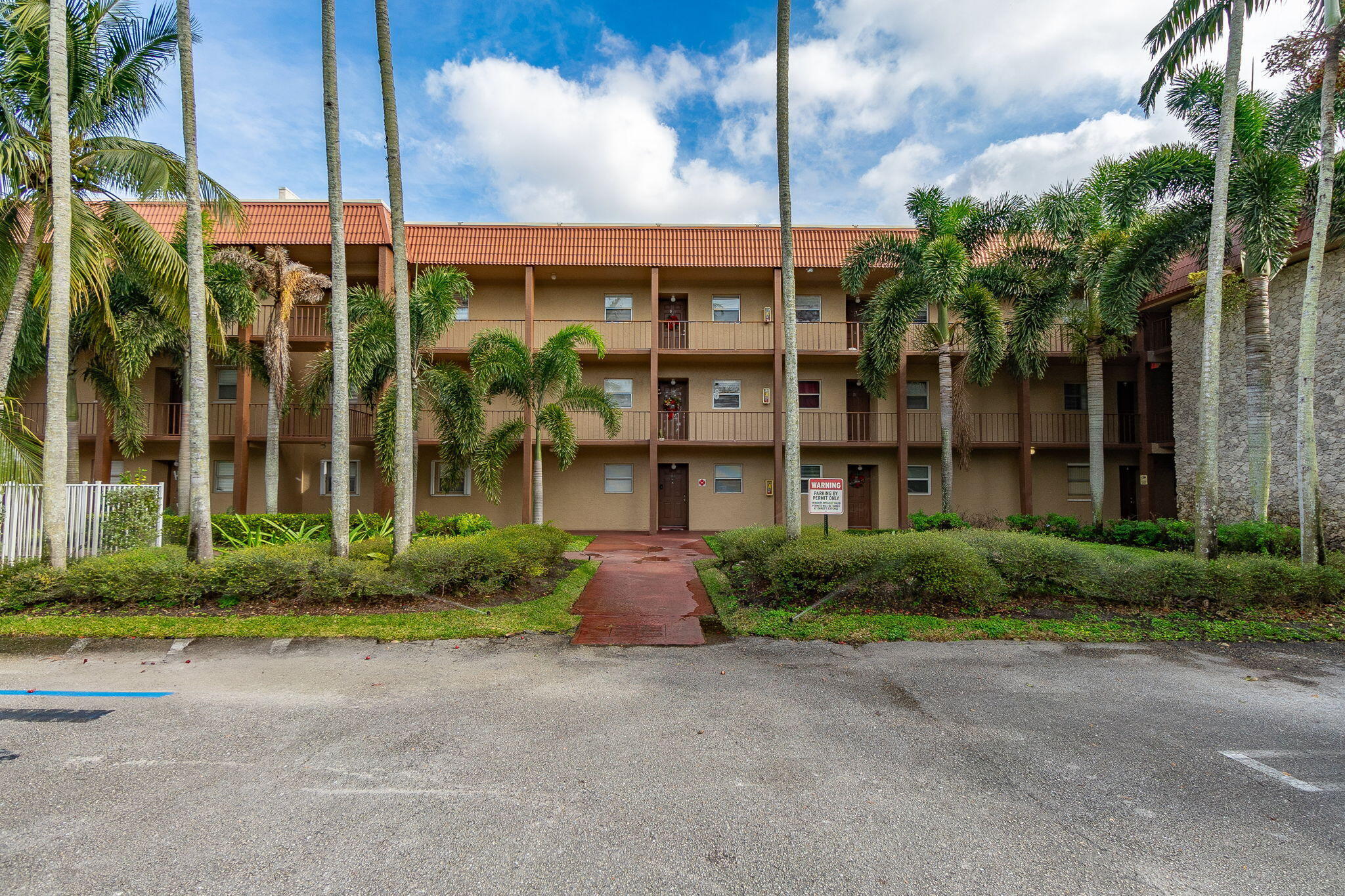 Located directly across from Veterans Park, this spacious 2-bedroom, 2-bathroom condo offers comfortable living in the heart of Royal Palm Beach. Situated on the third floor of a well-maintained building with elevator access, the unit provides both privacy and convenience.  The condo features a clean and inviting interior with a functional layout and generously sized living spaces. Enjoy an unbeatable location just minutes from major highways, shopping centers, restaurants, and everyday conveniences.