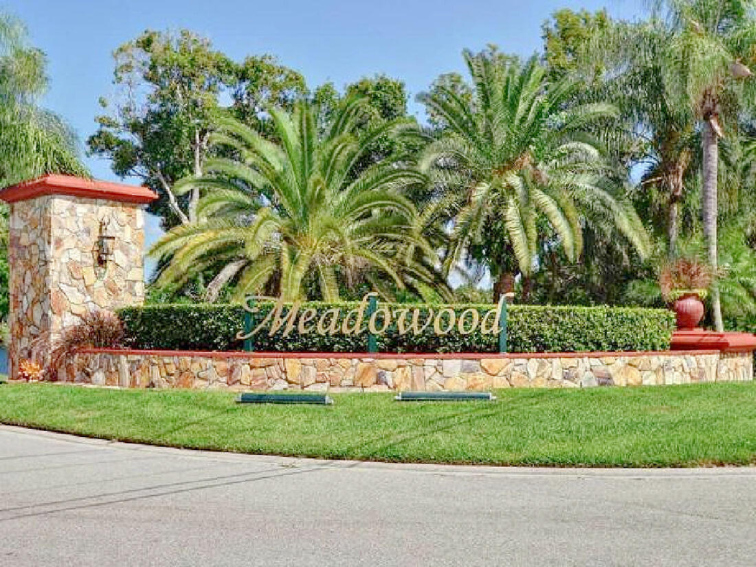 Beautfiul 2 bedroom 2 bath condo in Meadowood, a gated golf & tennis community in north Fort Pierce. Excellent location near 1-95 and Vero Beach. Short drive to the beaches of Hutchinson Island! This large and spacious condo comes with a 2 car garage! Freshly painted, new carpeting, new stove, new dishwasher & more. This is a great investment opportunity or 2nd home. Can be rented if owner so desires. Enjoy the great amenities at this beautiful Florida location with gated entry, 18 hole golf course, tennis, bocce ball, pickleball, fitness center, clubhouse, pool & more. Measurements approximate.