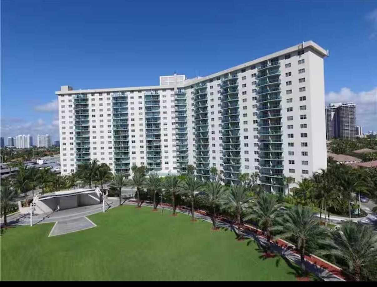This beautiful 2-bedroom, 2-bathroom apartment in the heart of Sunny Isles Beach in a building that allows short-term rentals!!! Perfect for vacation stays or income investment! It offers a rare and peaceful park view, creating a private and relaxing atmosphere. Located in one of the few buildings that allow daily rentals, it’s the ideal vacation getaway and an excellent income-producing opportunity. The apartment is also conveniently located close to a synagogue, adding extra comfort and accessibility for those who value nearby places of worship. The unit features new hurricane-impact windows, and the building recently completed a renovated lobby. Enjoy 24-hour concierge service and a full suite of amenities including a pool, tennis court, gym, playroom and convenience store.