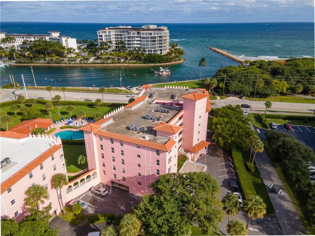 A SLICE OF PARADISE: Updated 2bed/2bath w/ garage parking located on 7 tropical acres at the Boca Inlet. Featuring Hurricane impact windows/doors, plantation shutters, open kitchen, white cabinets, granite counters & breakfast bar, tile flooring throughout, crown molding, & more. Large laundry room IN THE UNIT w/ storage & a folding counter. Enclosed patio enlarges the unit providing great views. Primary bedroom has an updated bathroom & walk in shower, second bath features a tub/shower combo. Enjoy the salt water pool, sauna, clubhouse w/ kitchen, BBQ & more. Located at the Boca Inlet near parks, the beach, dining++ Maintenance includes water, basic cable, on-site manager, insurance, common areas. Must own 2 years before renting. Min 6 months lease. All ages, Service pets​​‌​​​​‌​‌​​​‌‌​​​‌‌‌​​‌​​‌‌​​​​ OK