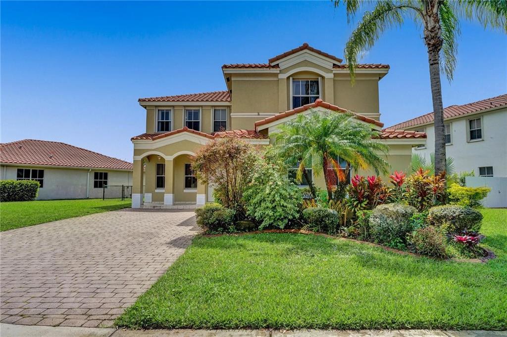 LOOK NO FURTHER!!Come to see this rarely available beautiful and  spacious 4/3.5 single family home in a beautiful gated community of Nautica! All bedrooms upstairs. Home featured tile flooring on the first floor. Updated kitchen with granite countertop, stainless steel appliance, walk in pantry. Impact garage door, hurricane shutters, oversized master bedroom, jack/jill suite and a lot more to offer!! Close to I-75 and all local shopping, restaurants and A-rated school district. Front lawn service and basic cable is included with HOA Fee. The Nautica development has a clubhouse with a community pool, tennis and basketball courts and sidewalks for residents to enjoy outdoor activities. It won't last long on the Market. Call today to request your private showing!