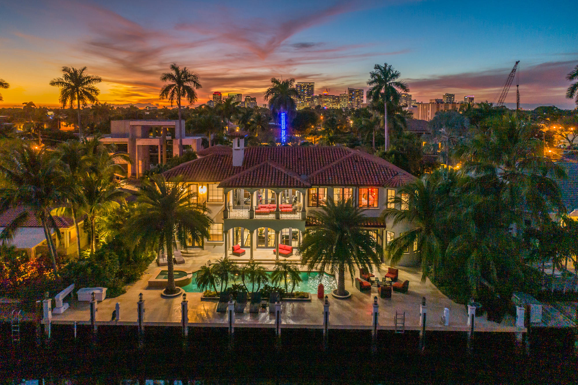 Bring your Yacht or Sport Fish! 100 Ft of Waterfront custom built 6,800 Sq Ft home in the Heart of Fort Lauderdale Beach, Florida. Just steps from the world famous Las Olas Boulevard in Las Olas Isles. 5 bedroom, 8 bathrooms, 4 car garage and gorgeous swimming pool/spa on 100 Ft of Deep Water dockage with electric Jet-ski  lift. Walk to the beach, 15 minutes from your dock to Atlantic Ocean. Yachtsman's Paradise, the property is bullseye to launch to best fishing grounds, dive sites, waterfront restaurants and bars or shove off to the Bahamas. 15 minutes to International Airport , Private FBO. 30 minutes to Palm Beach to the north or 30 minutes South to Miami. Home sold furnished, turn key. Bring all offers!