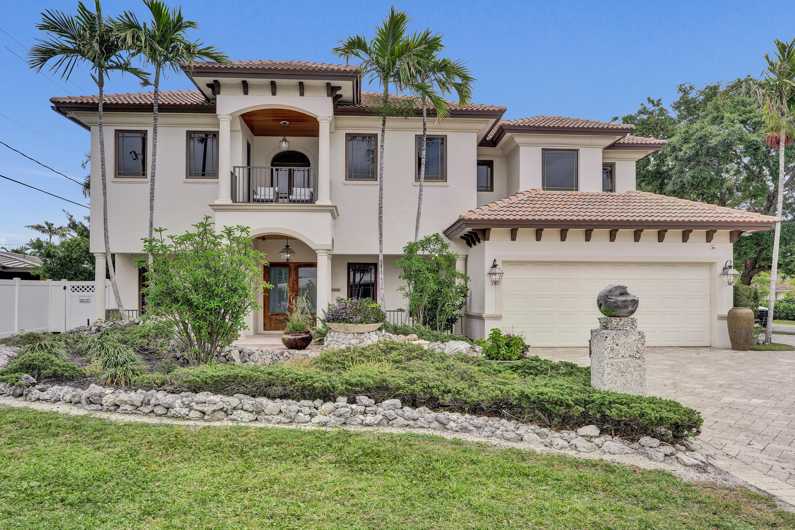 Large Coral Ridge estate home built new in 2008. Over 5,100 sq feet of living space plus 3 car garage and 2 large covered patios. Oversize lot is 135' deep allowing for plenty of patio space and yard plus a huge pool that screams fun. This home makes a statement with the 2 story living space and soaring ceilings. Huge Family room off the large kitchen all overlooking the pool. Great details include walk in pantry, 2 laundry rooms and butlers pantry. Floorplan offers 4 ensuite bedrooms (one on 1st floor) plus large office also on 1st floor (5th bedroom). All good size bedrooms. Incredible Master suite with covered patio, huge bedroom, 2 massive walk in closets and flex space (gym/office/third walk in). Incredible location. Close to the beach, best private schools and great park. Garage holds 3 cars there is a separate driveway with a garage door on side of house.