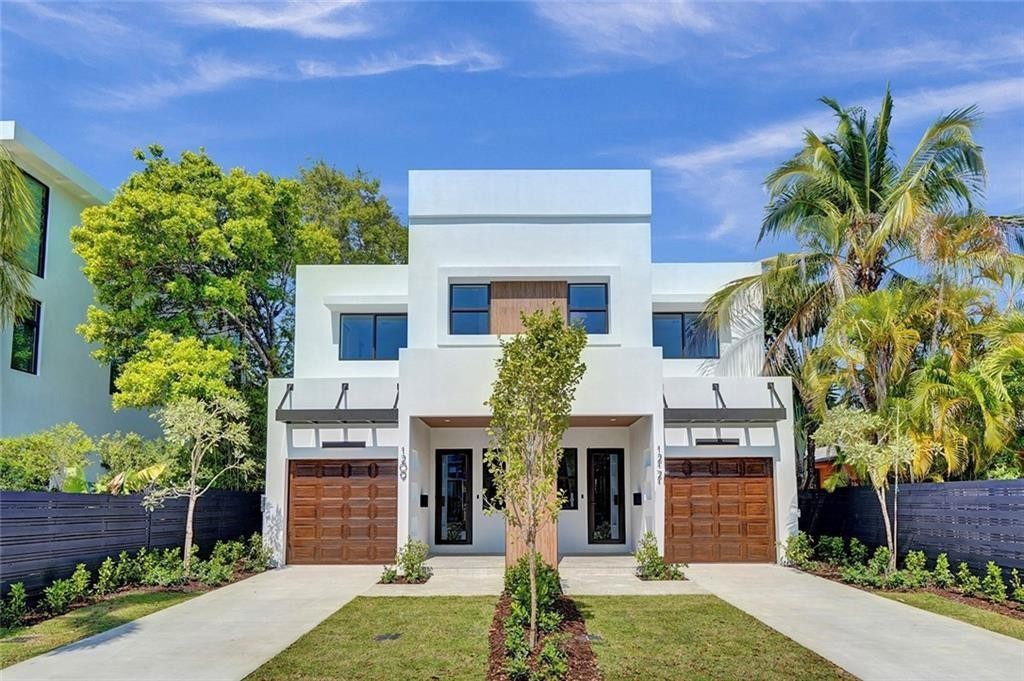 Contemporary newer 4 bedroom and 4 bath townhome with a pool in the heart of Victoria Park! located just steps to Las Olas and minutes to the beach. This modern townhouse features volume ceilings, Jenn-Air appliances, outdoor kitchen, salt water splash pool, and rooftop deck with endless views of the city! 1st Floor features 1 Bedroom, Full Bath, Kitchen, Living Room and Dining Room along with an outside kitchen! Upstairs you have your additional 3 bedrooms and loft area.