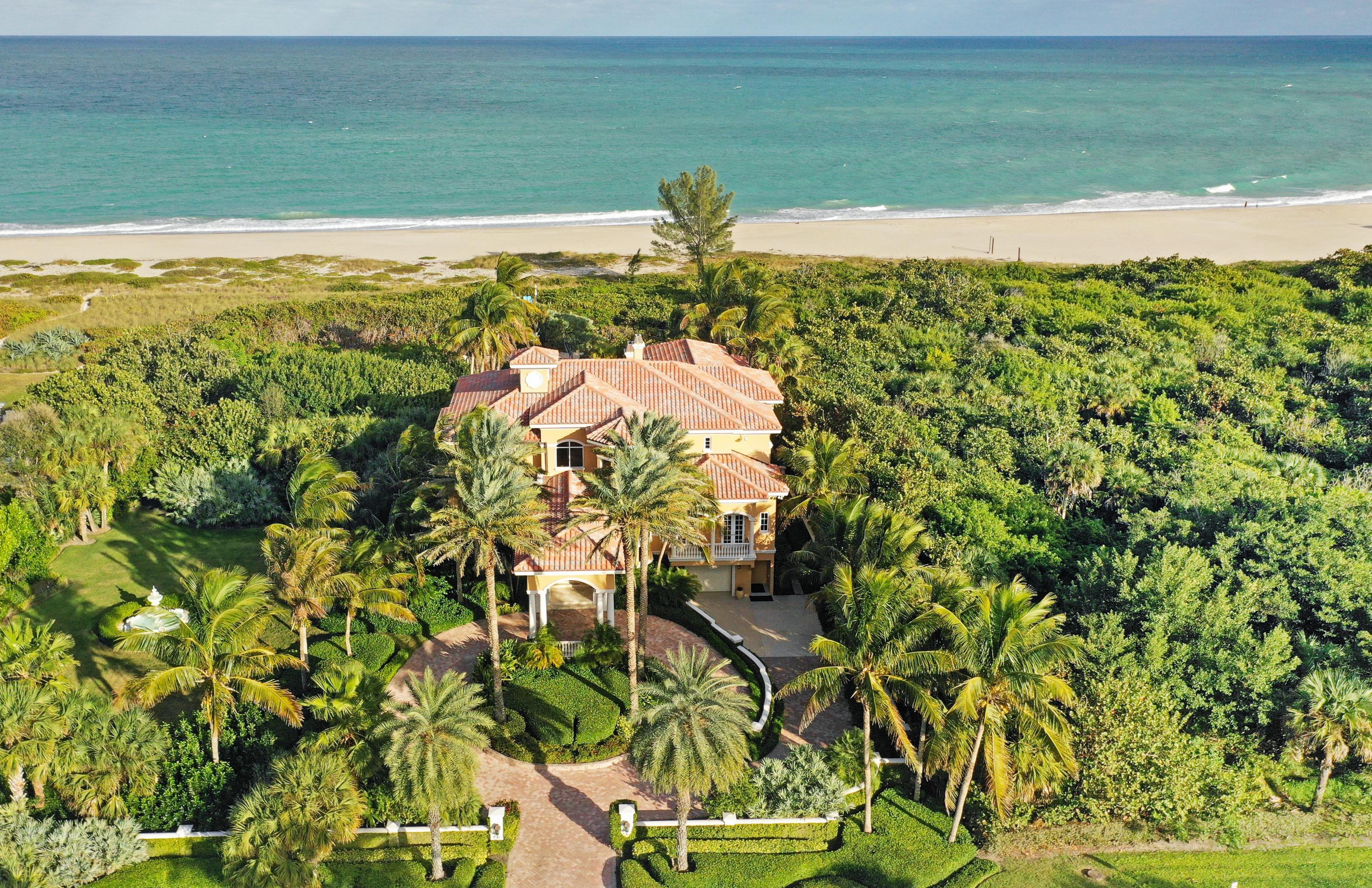 Stunning Mediterranean oceanfront estate in prestigious Riomar. Exceptional details throughout over 8000 sqft of living. One of Vero's finest built estates, featuring a dramatic salon with expansive ocean views, 3rd floor master suite with intimate hearth room, stately office, his & her bathes, workout room. 1st Floor 8 car gar, 12 seat home theater. Adjacent fully buildable lot avail.