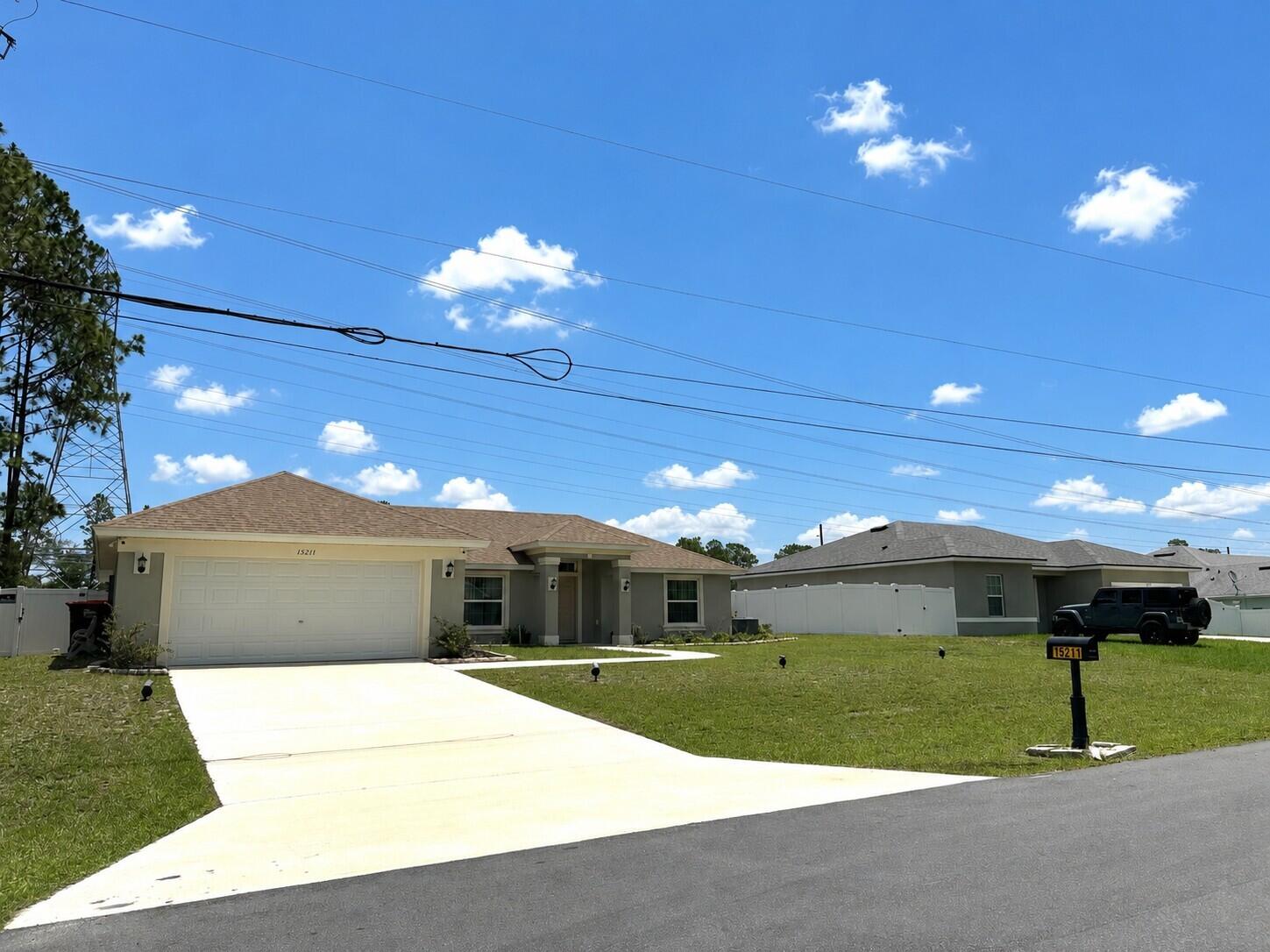 Newer Build without the wait. There is NO HOA and it is Move In Ready! This beautifully maintained 3-bedroom, 2-bath, 2-car garage modern style home features a bright and open-concept layout designed for today's lifestyle with comfort and convenience.  The open concept is ideal space for entertaining family and friends or enjoying everyday living. The spacious kitchen has a huge island, granite countertops, wood cabinets, stainless steel appliances and is adjacent to the great room and dining area. The split-bedroom floor plan provides privacy. The primary suite has a walk-in closet and ensuite bathroom with double sinks, a  soaking tub and a separate shower while two additional bedrooms ideal for guests, a home office, or hobbies. Enjoy added peace of mind with modern upgrades including security cameras, and a sprinkler irrigation system. The fully fenced vinyl backyard offers privacy and space for outdoor enjoyment, pets, or future enhancements. This home combines freedom, functionality, and value. The patio and outdoor space make it easy to enjoy Florida living year-round. Conveniently located near shopping, restaurants, medical facilities, and major highways. This beautiful home offers comfort, space, upgrades, and exceptional value all in one!  Great home as a primary residence or as a seasonal property - also a fantastic opportunity for Investors as there are NO rental restrictions - can rent Airbnb, short-term, and/or long-term.  Enjoy access to the World Equestrian Center, Hospitals, Medical Professionals, Theaters, Highways, Downtown Ocala, Restaurants, Entertainment, Grocery Stores, Shopping... Ocala/Marion County is officially named the "Horse Capital of the World®", a testament to the County's unique involvement in all things equestrian and its record of producing some of the finest champions.