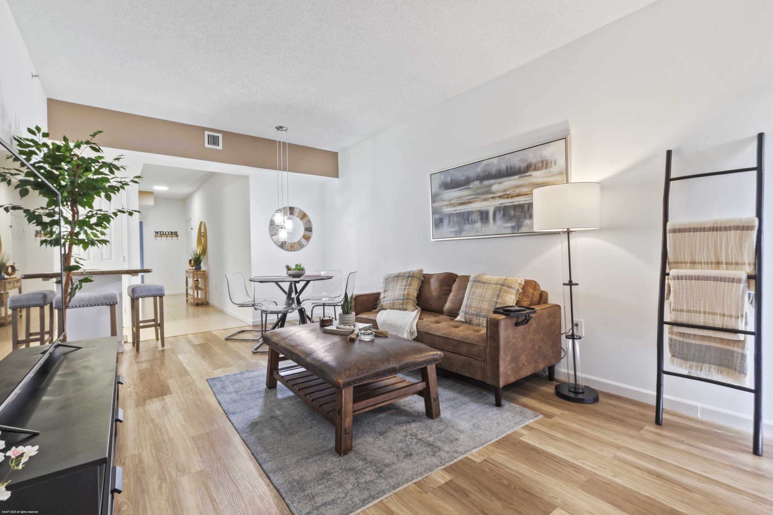 At just 2 miles to Wellington International, this is the perfect rental for those needing to get back and forth with ease during season. Enjoy peace and privacy in this renovated and clean, top-floor Arissa Place condo - great for riders, professionals, vets, blacksmiths, staff, and team alike. This 3-bedroom, 2-bathroom property features blackout curtains in all bedrooms, begging you to sleep in on your days off. Two of the bedrooms have walk-in closets. The primary bathroom features an oversized tub/shower to soak in after long days at the showgrounds. Relax on the covered balcony with serene views of the Polo West preserve, or enjoy the community pool, spa and fitness center. Biking distance to brand new Publix, restaurants, banks and more. Available annually as well.