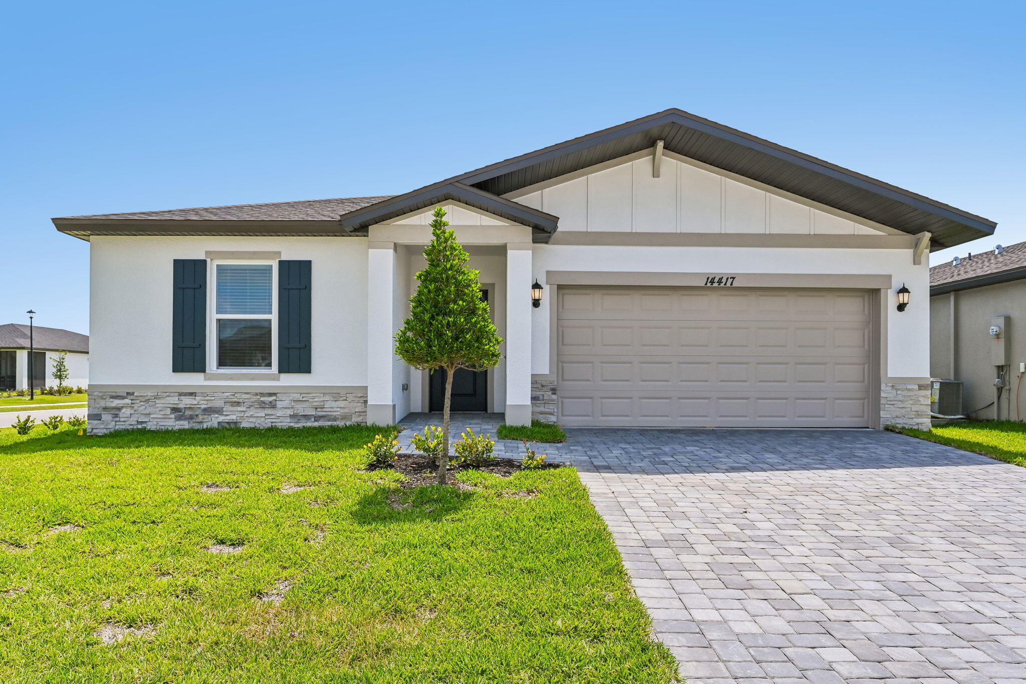 BRAND NEW energy - efficient home! Prepare dinner while catching up on the day's events from this home's open kitchen which overlooks a spacious great room and dining area. Retreat to your primary suite that is conveniently situated in the back of the home for plenty of privacy.  New single-family homes in Indiantown, future residents will have access to resort-style amenities including a clubhouse, pool, walking trails, and more. With convenient access to both Martin and Palm Beach County, Terra Lago will be the perfect place to call home. Each of our homes is built with innovative, energy-efficient features designed to help you enjoy more savings, better health, real comfort and peace of mind.