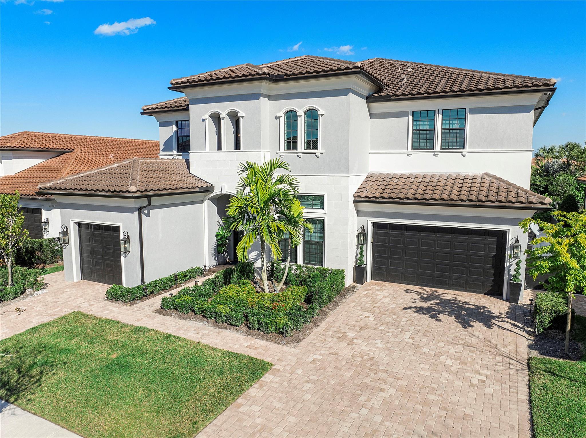 Indulge in the epitome of luxury living at this magnificent 2 story home nestled in the affluent city of Parkland. This residence exudes opulence at every turn. A haven for entertainment, the backyard boasts a saltwater pool and spa, complemented by an outdoor kitchen and fire pit, offering a seamless blend of sophistication and relaxation. Step inside to discover a sanctuary of modern elegance, with upgrades gracing every corner. The gourmet kitchen is a culinary masterpiece while the primary suite is a retreat of its own, offering serenity and indulgence.  This exclusive community provides access to a state-of-the-art clubhouse, featuring a beach-entry pool, fitness center, culinary kitchen, and a kids' club. The epitome of refined living awaits, where luxury meets lifestyle seamlessly.