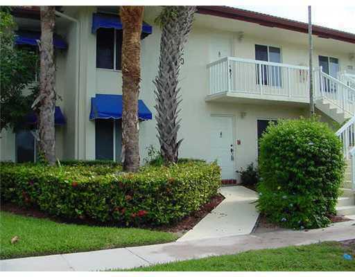 Located on a private canal lot,this neutral & clean 2/2 ground floor unit offers white ceramic tile flooring & beige carpeting,white kitchen cabinetry & countertops,custom window blinds, walk-in Master closet, washer & dryer & a screened tiled patio overlooking a grassy area & canal.  With the current tenant occupying for 10 years, this condo unit provides an immediate investment opportunity with a tenant in place. Cable & water included in maintenance fee.