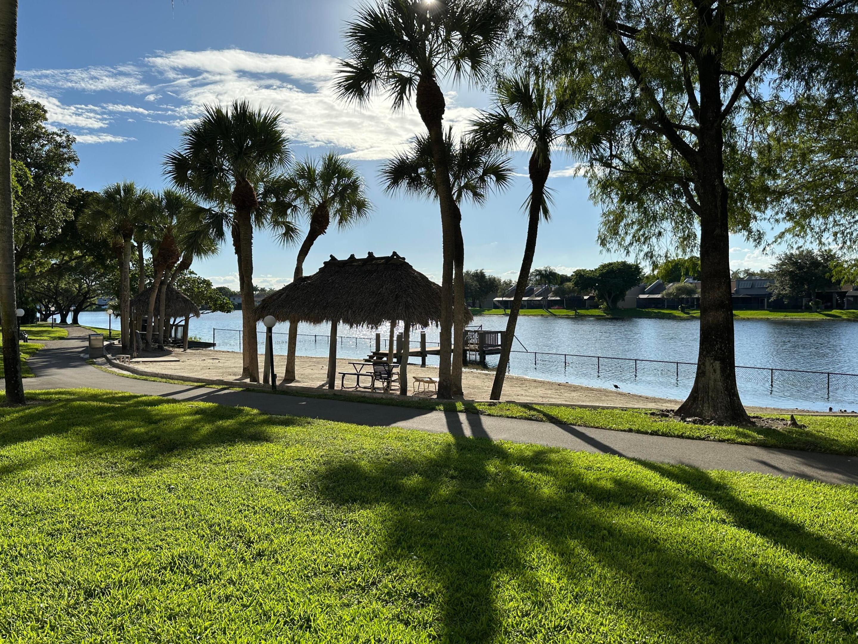 Wake up each morning to peaceful lake views in the highly desirable Colony Point community. This beautifully updated 55+ condo offers the perfect blend of comfort, convenience, and active living. Located just minutes from shopping, grocery stores, dining, and Memorial West Campus, everything you need is close by while still enjoying a quiet lakeside setting. Inside, you'll find upgraded flooring throughout, including elegant rectified edge tile and warm wood floors. The updated kitchen and baths create a move-in ready experience, while the enclosed den offers flexible space for guests, a home office, or additional bedroom. Just a short walk to the clubhouse and mail center, you'll love the vibrant community lifestyle and full calendar of activities. HVAC replaced in 2021.