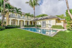 Built in 2004 the home features a grand 2-story entry foyer that leads to a traditionally thought out home with 10 ft ceilings. Large kitchen with breakfast area that leads to a huge gathering space with French doors leading onto the covered loggia and summer kitchen with built in grill. Loggias stretch around the pool and offer garden and pool views from most first floor rooms. Elevator and grand staircase lead to the 2nd floor master with his/hers baths, steam shower, whirlpool tub and balcony with pool views. 2-car garage accessed through the rear private lane way.