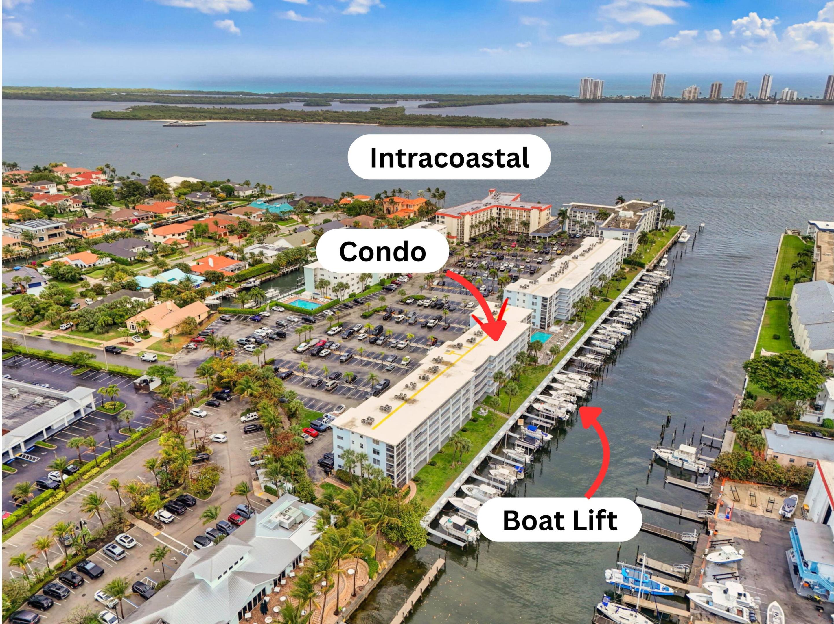 Boaters Dream!! Don't miss this rare opportunity to own a spectacular 1 bedroom, 1 bathroom waterfront condo that includes a 40 x 16 deeded boat slip with a BRAND NEW 24,000 LB lift! This beautifully maintained unit features impact windows, new flooring, fresh paint, and an updated kitchen, along with a Remodeled bathroom. Perfectly suited for both boaters and those who love waterfront living. Ideally located just off the Intracoastal Waterway on the Earman River, you're only minutes from the stunning Atlantic Ocean with NO FIXED BRIDGES!! Just steps from your front door, enjoy waterfront dining or unwind by the pool while watching boats cruise by. Conveniently located with easy access to I-95, PBI Airport, and some of the area's best shopping and dining. Deeded Boat slip. 40' of slip.