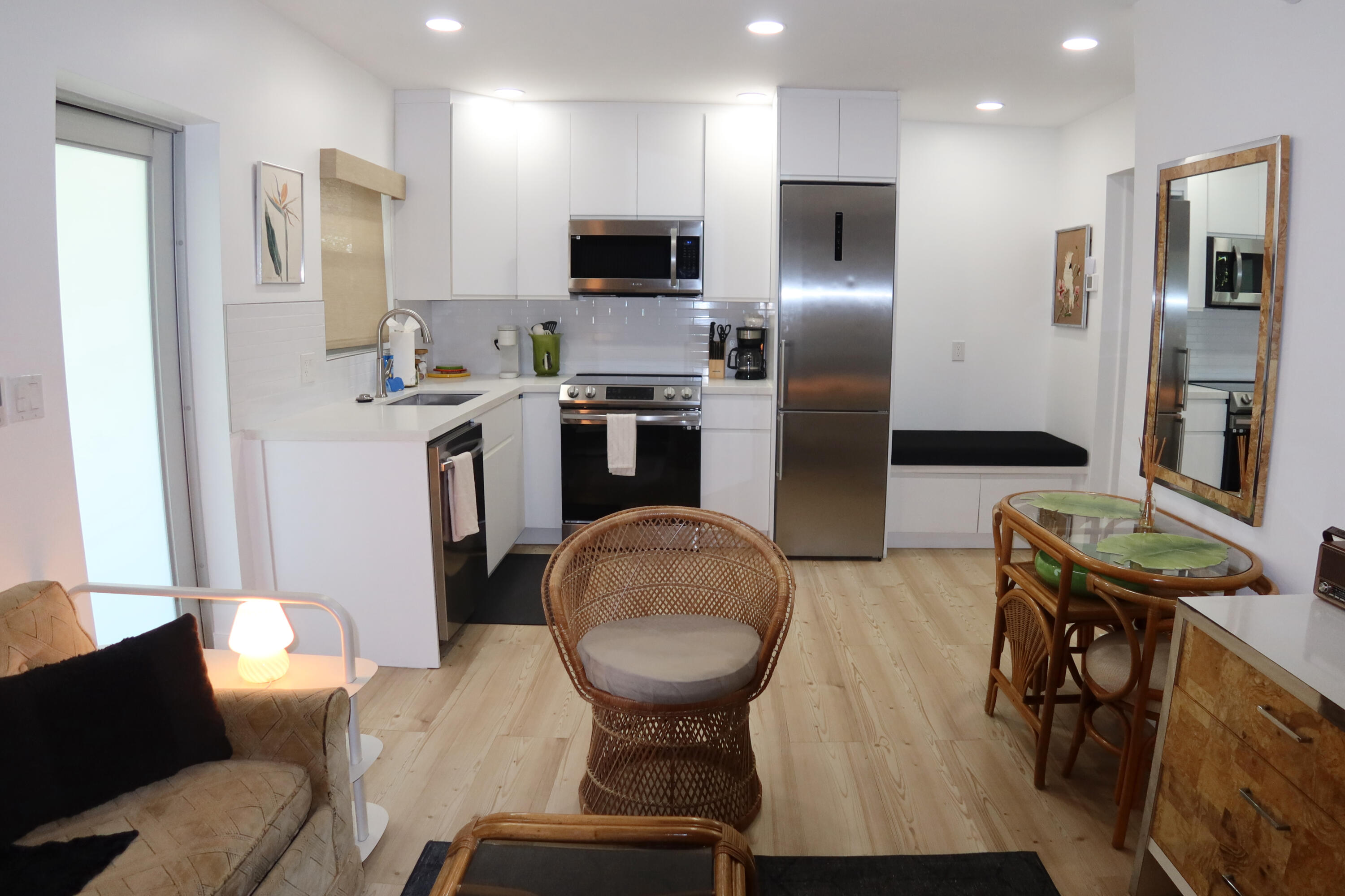 Discover effortless coastal living in this beautifully updated, fully furnished 1-bedroom and 1-bathroom first-floor apartment in the heart of Pompano Beach. Move-in ready and thoughtfully designed, this light and bright residence features a modern kitchen with white cabinetry, quartz countertops, stainless steel appliances, luxury vinyl flooring, and contemporary finishes throughout. The open-concept living space  perfect for relaxing or entertaining.  Ideally located just a 10-minute walk to the beach, you'll also enjoy easy access to an abundance of restaurants, shopping, entertainment, and everyday conveniences. Whether you're working remotely, or simply looking to enjoy the South Florida lifestyle, this annual furnished rental offers exceptional value in an unbeatable location. unbeatable location.  Available mid-July. Don't miss this opportunity to enjoy beachside living in a stylish, turnkey residence. Schedule your private showing starting July 8th.