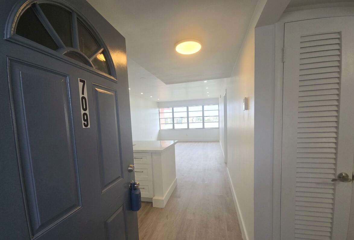 SELLER IS CONTRIBUTING $5,000 toward the buyer's closing costs. CORNER UNIT 1-bedroom, 1-bath in 55+ community, FULLY REMODELED AND BRIGHT SPACIOUS DESIGN with brand-new vinyl flooring, freshly painted interior, and an INCREDIBLE PANORAMIC SKY LAKE VIEW offering NATURAL LIGHT, SERENITY, AND TRANQUILITY. WAKE UP TO LAKE VIEWS EVERY DAY. MODERN OPEN-CONCEPT KITCHEN with STAINLESS STEEL APPLIANCES, large walk-in closet, assigned parking near elevator, and ample guest parking. WELL MAINTAINED BUILDING with great amenities including 2 pools (1 heated), gym, and library. PRIME LOCATION just minutes from Sky Lake shopping center, Expressway I-95, Biscayne Blvd, Aventura Mall, dining, and entertainment and more. MOVE-IN READY!!!