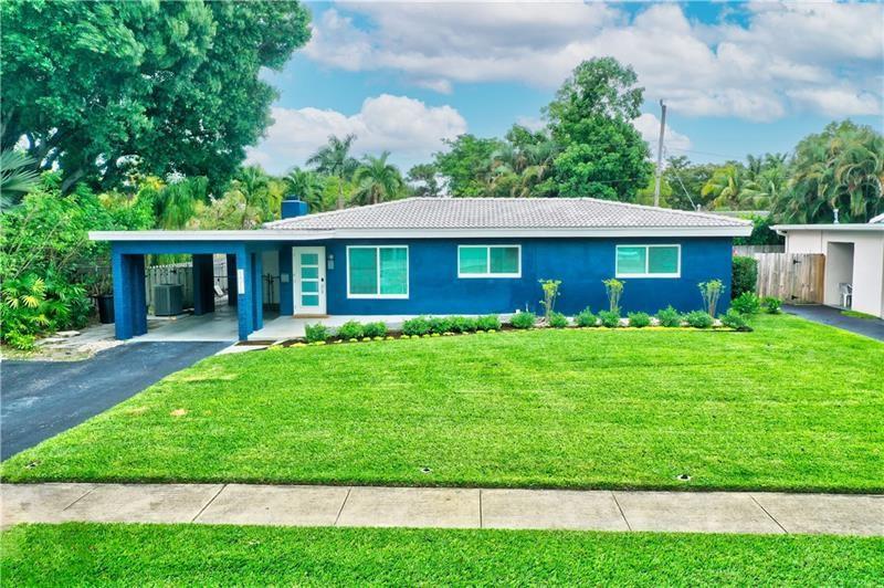 Newly renovated and fully furnished tropical pool home on an oversized lot in the heart of booming Pompano Beach.  This home features a stunning white kitchen and a marble island with bar-style high top seats. and stainless steel appliances perfect for entertaining.   Spacious open concept living room and separate family room.  Hurricane impact windows and a whole house generac.  Each bedroom includes high-end memory foam mattresses, smart tv, and new furnishings.  Extremely quiet and quaint neighborhood with very low traffic volume.  Great location close to beach, restaurants and airport. Fully furnished interior and turnkey - currently being operated as an Airbnb.