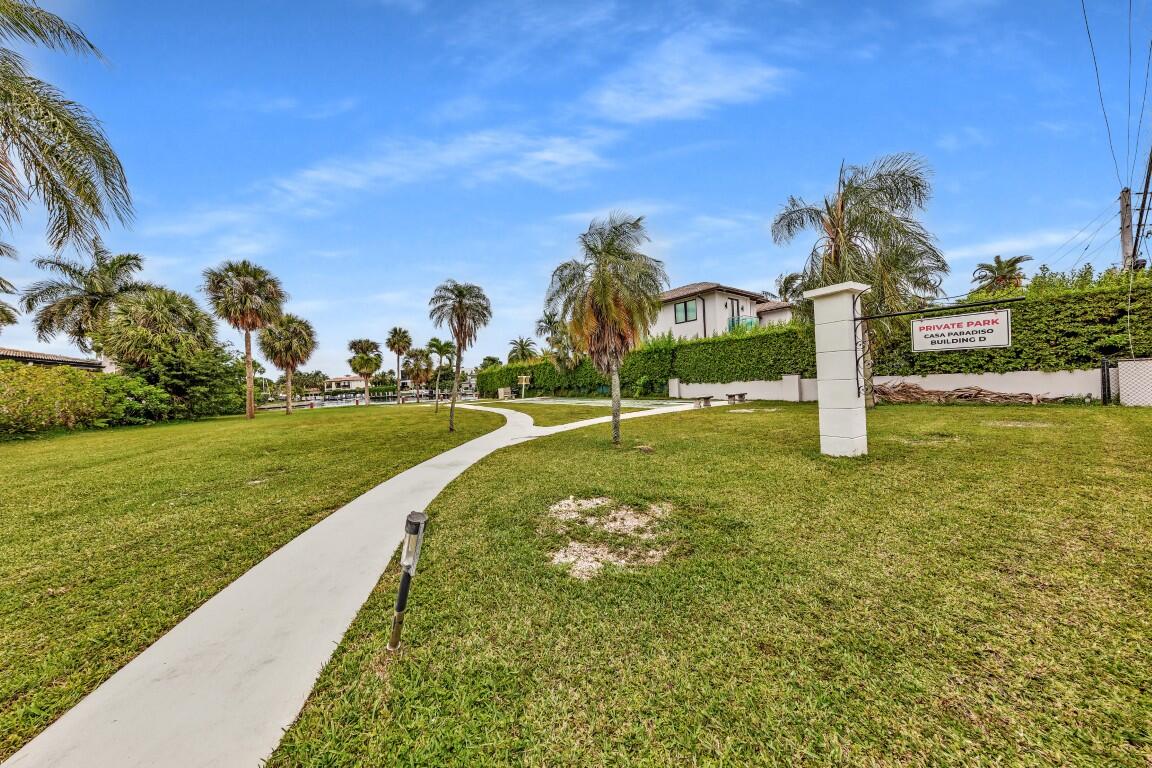 Experience elevated coastal living in this fully renovated 2 bed, 2 bath co-op in Hallandale Beach's sought after Casa Paradiso. Surrounded by million dollar homes, every inch of this 1,000 sq. ft. property has a modern, high end aesthetic, from the exceptional porcelain tile flooring to the sleek, designer level finishes throughout.  The kitchen and both baths have been remodeled. Impact windows and doors. And with the pool only steps away, every day is a South Florida getaway. This well maintained community is just minutes from the beach, Gulfstream, the Casino, and top dining, and is walking distance to 7 restaurants and the dog park. New roof -2023. A/C new-2023. H2O heater in 2022. Association owns the adjacent private waterfront access park and private lot, and has adequate reserves.