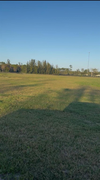 THE VERY BEST LOT ON THE MARKET IN HOMELAND!  Cleared and ready to build your dream home or farm!  This outstanding lot is permitted to allow NO POND OR ADDITIONAL WATER RETENTION AREA so it is a FULL 5 buildable acres!  Welcome to the gated Homeland community minutes from PBIEC, WEF, Polo and Global Dressage!  Recent changes to the bylaws now will allow equestrian businesses, boarding, training and breeding.  A wonderful opportunity to build a private estate or Equestrian business. A TRUE FIND!!