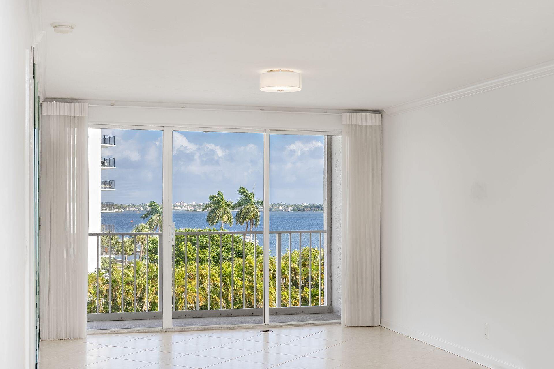 Turnkey 2-bedroom, 2-bath residence with in unit washer dryer now available for the 2026-2027 season, offering North East views of the Intracoastal. This light-filled condo features updated floors and finishes throughout. Pet friendly building, with covered parking. Ideally positioned along the highly desirable South Flagler corridor, just moments from the Southern Bridge, this residence places you at the gateway to Palm Beach Island and neighboring the prestigious estates of SoSo and West Palm Beach's "Billionaires Row." Enjoy effortless access to world-class dining, shopping, and lifestyle destinations including CityPlace, Worth Avenue, and beyond—all within minutes of Palm Beach International Airport. An exceptional opportunity for those in transition, this offering is perfectly suited as a refined one-year lease—allowing you to immerse yourself in one of West Palm Beach's most coveted waterfront locations while you take the time to find your next permanent residence. Wake up to water views, experience the lifestyle, and position yourself for your next move—all from an unbeatable vantage point. A Must see!