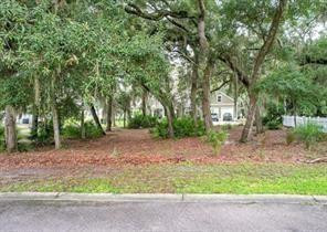 Discover this enchanting, corner home site in Watermans’ Bluff, where history, tranquility, and Southern Charm harmoniously converge.  Nestled within a gated community on a 19th-century plantation, existing homes will transport you into grace and elegance with their low country style and inviting, “rocking chair” front porches.  Experience the allure of a waterfront park with a deep-water pier for fishing, kayak launch, and mesmerizing views of the marsh and river.