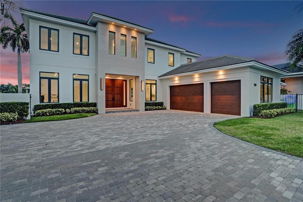 Breathtaking Coral Ridge Waterfront Home Featuring 4 Bedrooms 4.5 Bath Plus Office & a 3 Car Garage. Located in the Desirable A Rated Bayview Elementary School District. First Floor Features an Open Floor Plan with an In-Law Suite/Full Bath, Office, Half Bath and Laundry Room. Take the Elevator Upstairs to Find your additional Bedrooms and 2nd Laundry. Master Bedroom Features a Balcony, 2 Walk in Closets and a Sitting Area. You're Minutes away from Las Olas Blvd, Beaches, Galleria Mall and the Finest of Cuisines. Contemporary Modern Construction with Private Dock, Generator, Salt Water Pool and No Fixed Bridges.