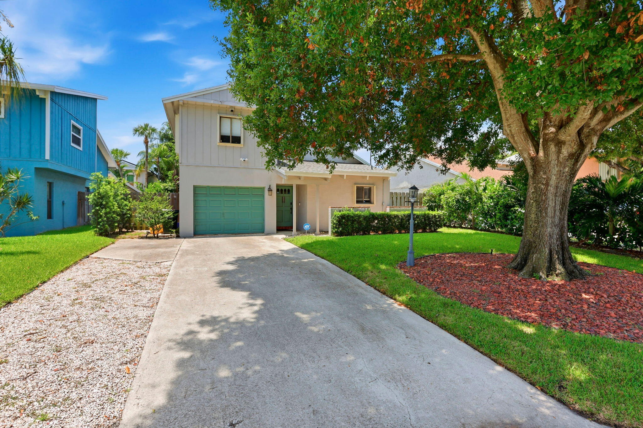 Located in lush and peaceful Southridge, east of I-95 with NO HOA, this tastefully updated home offers the perfect blend of comfort, convenience, and Delray Beach lifestyle. This 3 bedroom home also features one bedroom downstairs , good for a bedroom, gym or home office. The kitchen, appliances, and bathrooms were beautifully updated in 2019, creating a modern and move-in ready feel throughout. Major improvements include a brand-new roof in 2026 and new A/C in 2025 for added peace of mind. The large backyard has plenty of room for a pool. Enjoy quiet surroundings while being just minutes from shopping, restaurants, entertainment, and the beach. A rare opportunity to enjoy an updated home in a prime location without HOA restrictions.
