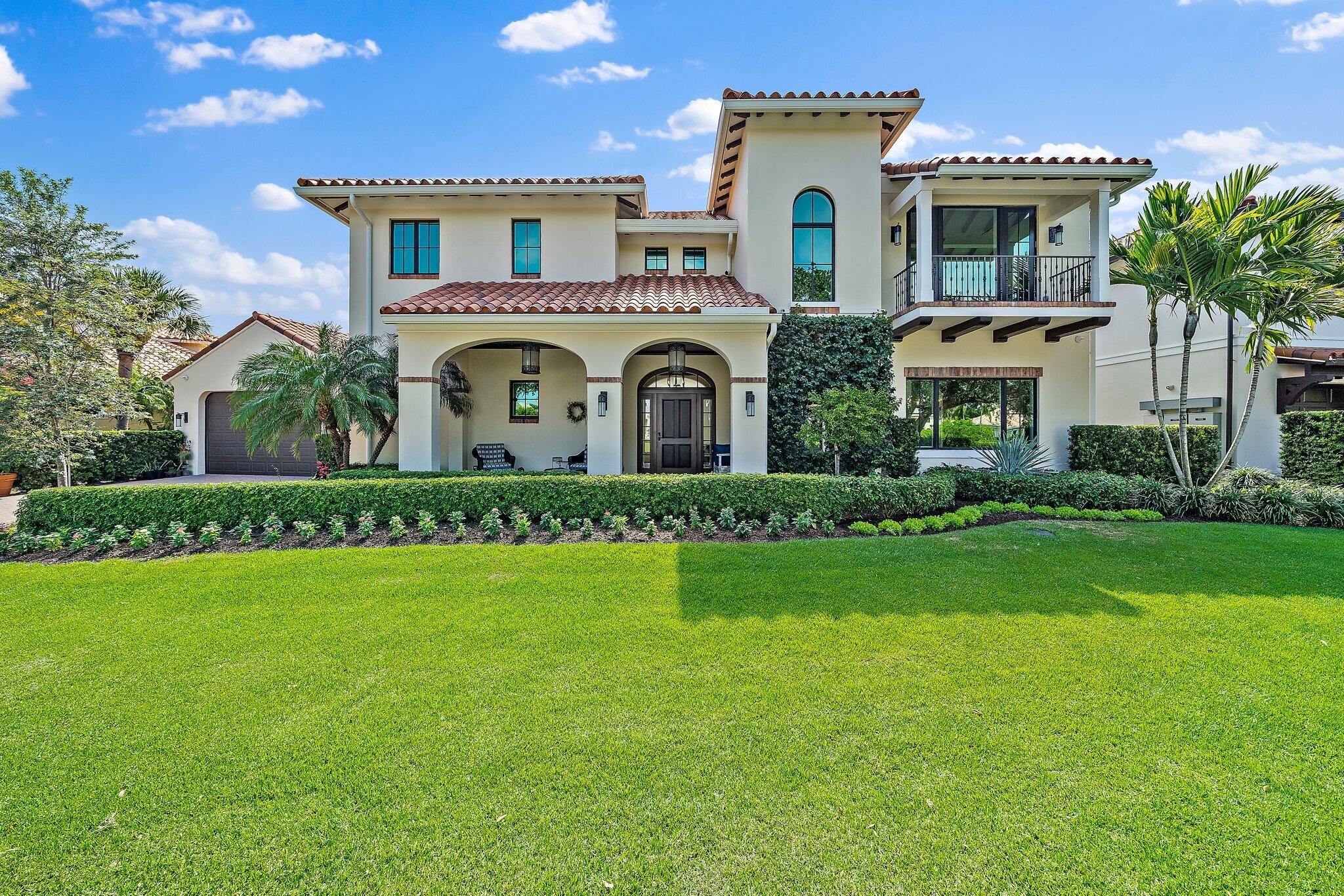 Extraordinary waterfront single family home with phenomenal interior and exterior finishes, a private pool and a private 80' dock with Intracoastal access!   Custom built in 2018, this unique home offers a spacious interior with 4,225 s.f. of air-conditioned living space including four spacious bedrooms with en-suite bathrooms, volume ceilings and elegant finishes throughout.  Main entrance welcomes you with a covered porch entry overlooking the sixteenth green, an attractive foyer with an elevator and a decorative staircase with hand painted tiles. The first floor provides for an open kitchen with an adjoining air-conditioned loggia, an oversized great room with a fire place, a formal dining area, and a prestigious master suite with soaring ceilings.  The second floor offer three guest suites with en-suite bathrooms, attached balconies and ample closet spaces.  There is also an open loft area with a storage closet and a secondary laundry area.   Exterior features boast an oversized open patio with an infinity pool/spa, a private 80' dock with Intracoastal access, a front porch and covered & open balconies with stunning waterfront or golf views.  This magnificent home is protected with impact glass windows & doors and is complimented with an oversized two car garage and separate golf cart garage.  Quarterly dues include $1,100/HOA + $830/JLPOA.  One-time capital contribution of $830 payable to the JLPOA.  Showings by appointment, LO to accompany.  All sizes and fees are approximate!
