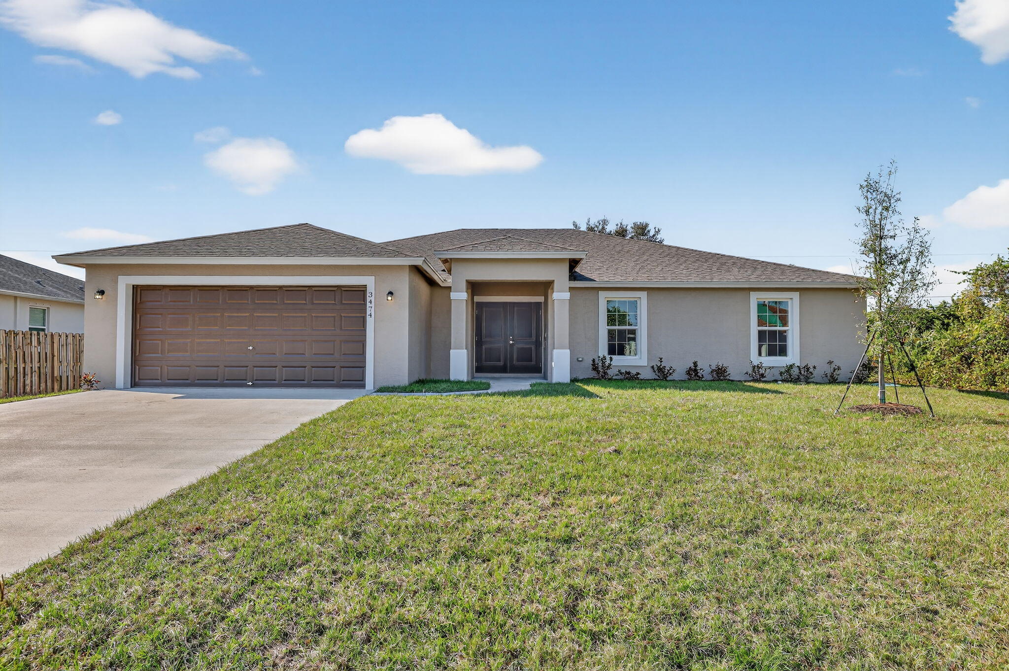 Brand new and built to impress! The popular Expanded Bradford model offers 4 BR, 2.5 BA, a 2-car garage, and 2,027 SF under A/C—thoughtfully upgraded, not stripped down. Enjoy plank tile in the main living areas, upgraded carpet in the bedrooms, and a gourmet kitchen featuring granite countertops, a spacious center island, and stainless steel appliances. Spray foam insulation, impact windows, and a huge covered patio add comfort, efficiency, and year-round enjoyment. Full builder warranties included. Estimated completion mid-August 2026. Ideally located with quick access to I-95 and Florida's Turnpike, and just minutes from Tradition's popular shopping, dining, entertainment, parks, and community events.