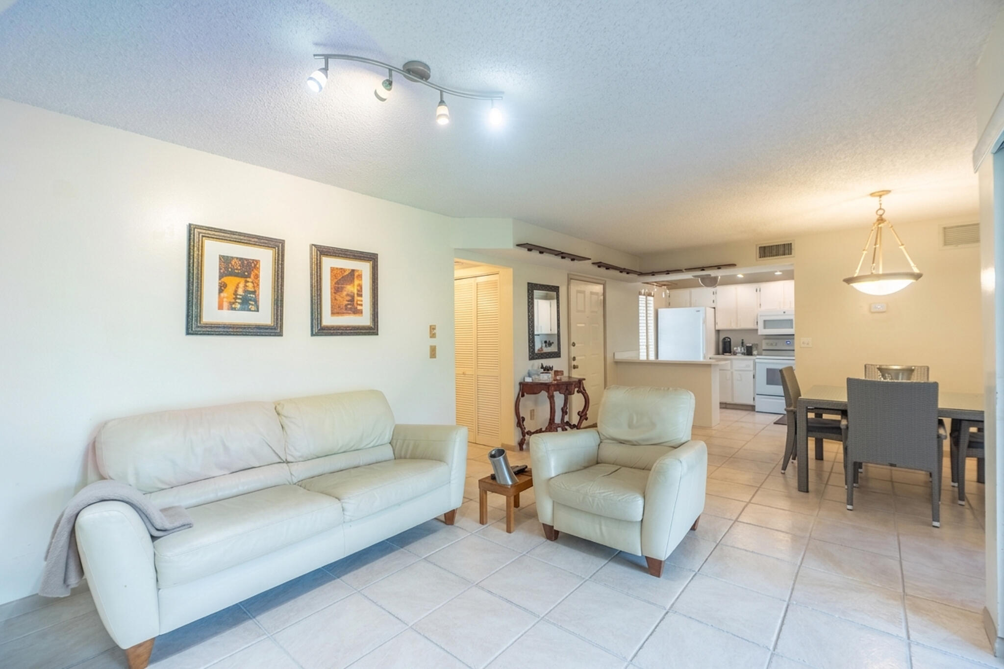 QUATRAINE AT JACARANDA GARDENS - Residential