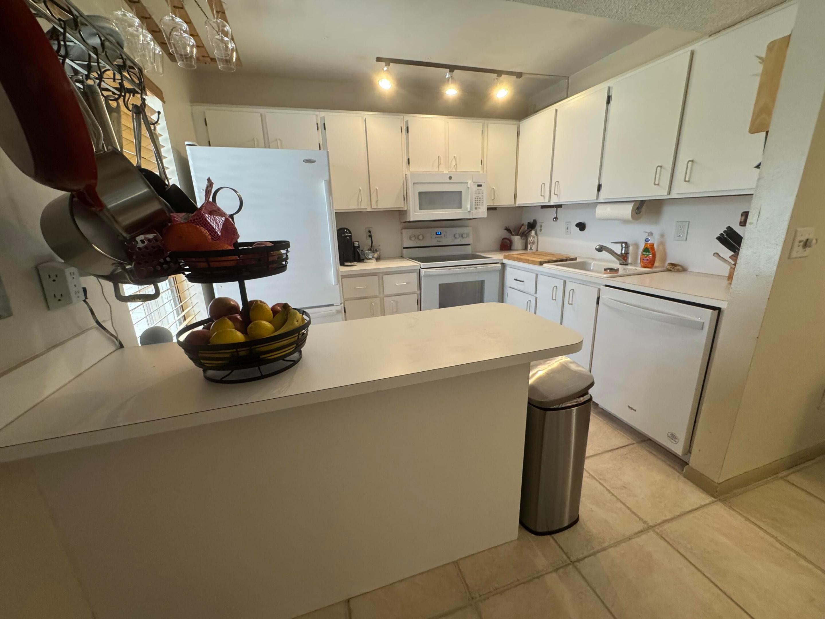QUATRAINE AT JACARANDA GARDENS - Residential
