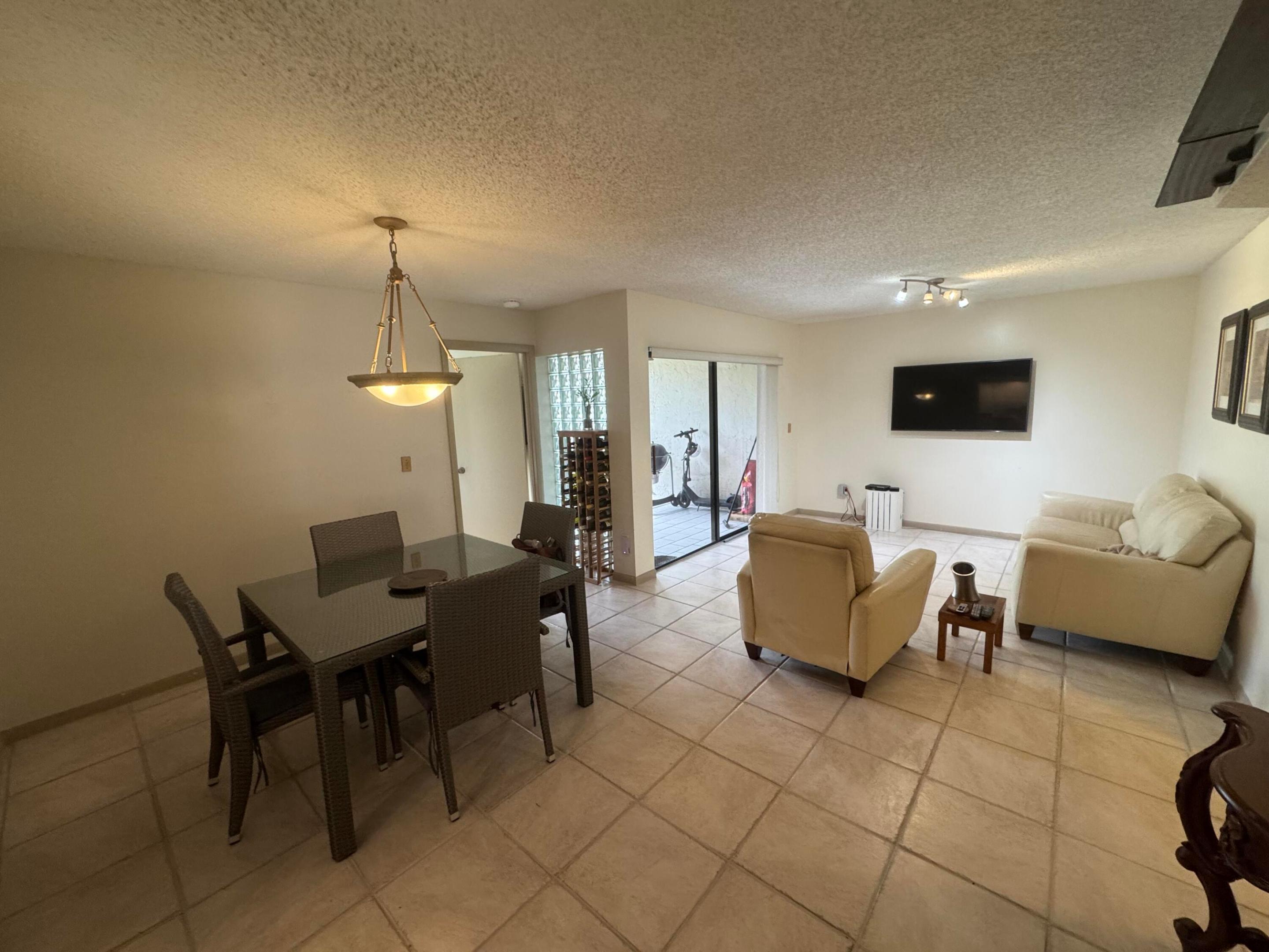 QUATRAINE AT JACARANDA GARDENS - Residential