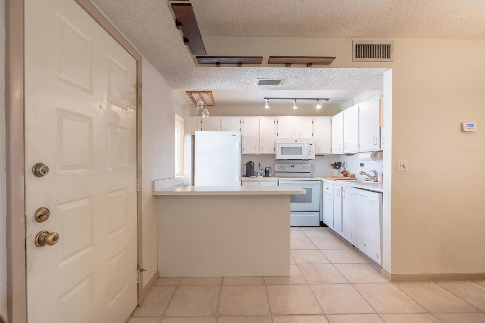 QUATRAINE AT JACARANDA GARDENS - Residential