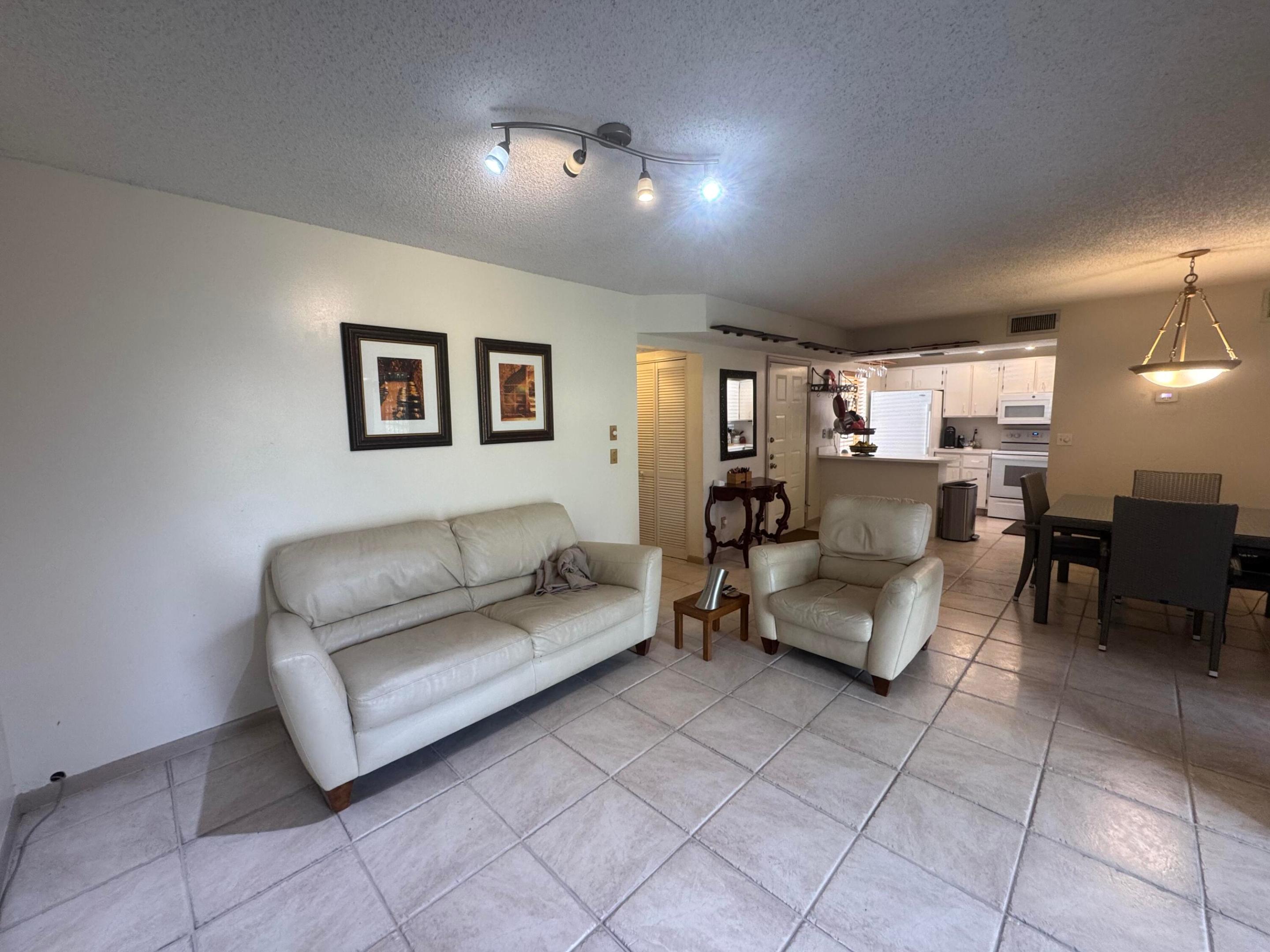 QUATRAINE AT JACARANDA GARDENS - Residential