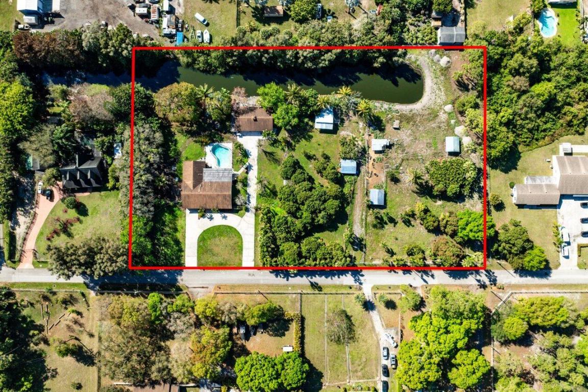 A truly rare opportunity to own 3.5 acres in town perfect for a landscaping business, nursery or agricultural use. 

This property is also horse friendly and features two existing stables, with abundant space for additional stalls, pasture, and a riding arena. The main home offers split bedroom floor plan,4 bedrooms and 2 bathrooms with a bright, open feel, light tile flooring throughout, stainless steel appliances, and an oversized two-car garage. Plus a spacious primary suite with dual vanities and a walk-in closet with French doors out to the pool.  A separate guest home includes 2 bedrooms, 1 bathroom, an updated kitchen, tile flooring, and a 1.5 car garage, w/ private driveway perfect for multigeneration living or an office. Relax and entertain in the pool and spacious patio area. The 3.5-acre parcel also qualifies for subdivision into three 1+ acre separate lots, offering exceptional future potential.