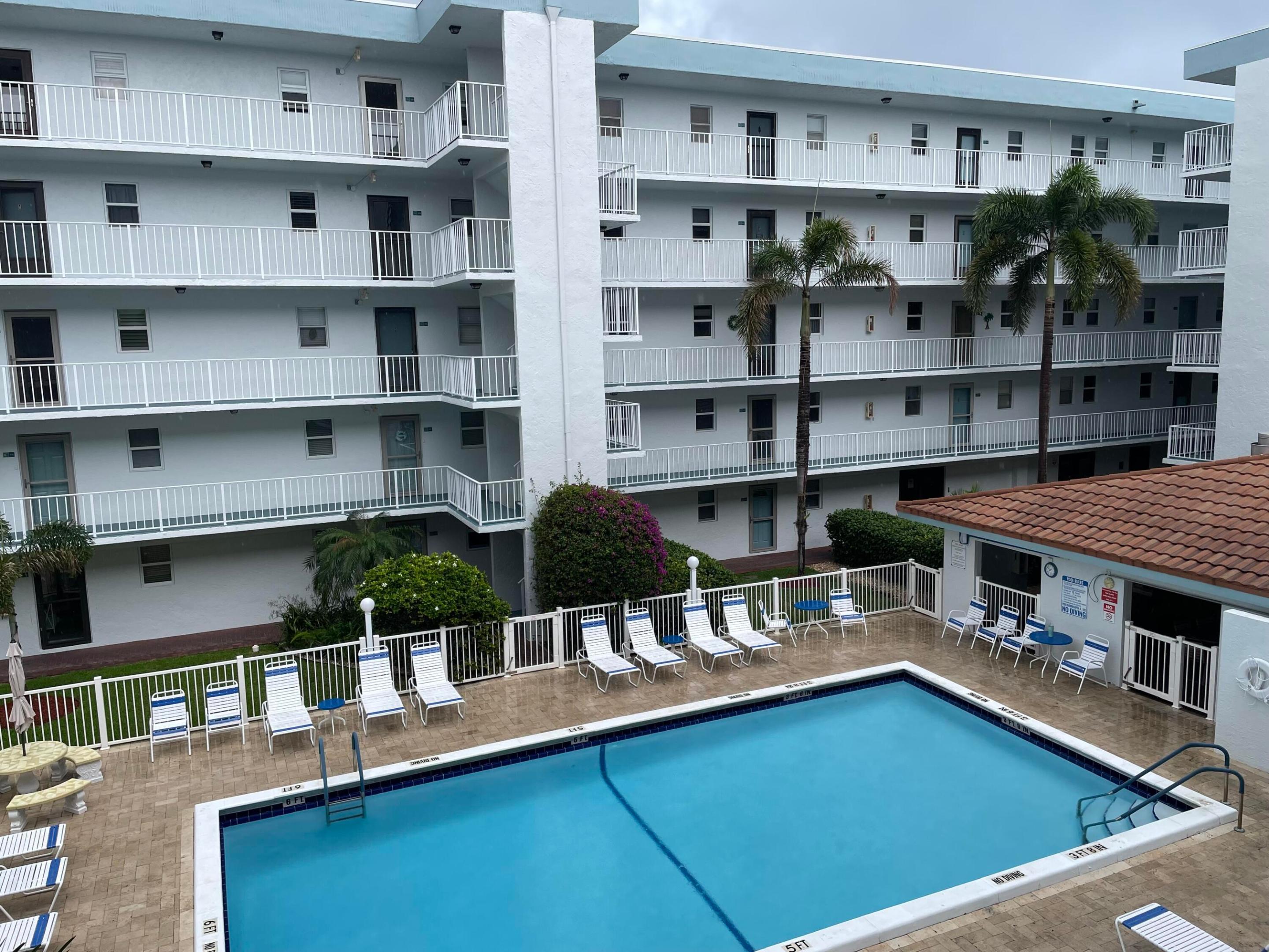 Condo living at its best! Prime location in the heart of the quaint seaside town of Lauderdale by the Sea.  This spacious 2 bed/2 bath condo has almost 1,200sf of living space plus a large, west facing balcony. The well-designed split bedroom floor plan includes plenty of closet space and 2 ensuite baths. The large kitchen has a big passthrough to the living area. Its great 4th floor location was the original model home with spectacular sunset views and is ready for your updates. Enjoy the heated pool, the cabana with bbq grills and tropical landscaping in the well-maintained Poinciana by the Sea condo. Association has low fees and healthy reserves.  This condo is an unparalleled value in the walkable town with its pristine beaches, snorkeling, close by shopping and vibrant downtown!  Condo living at its best! Prime location in the heart of the quaint seaside town of Lauderdale by the Sea. Great walkability.
