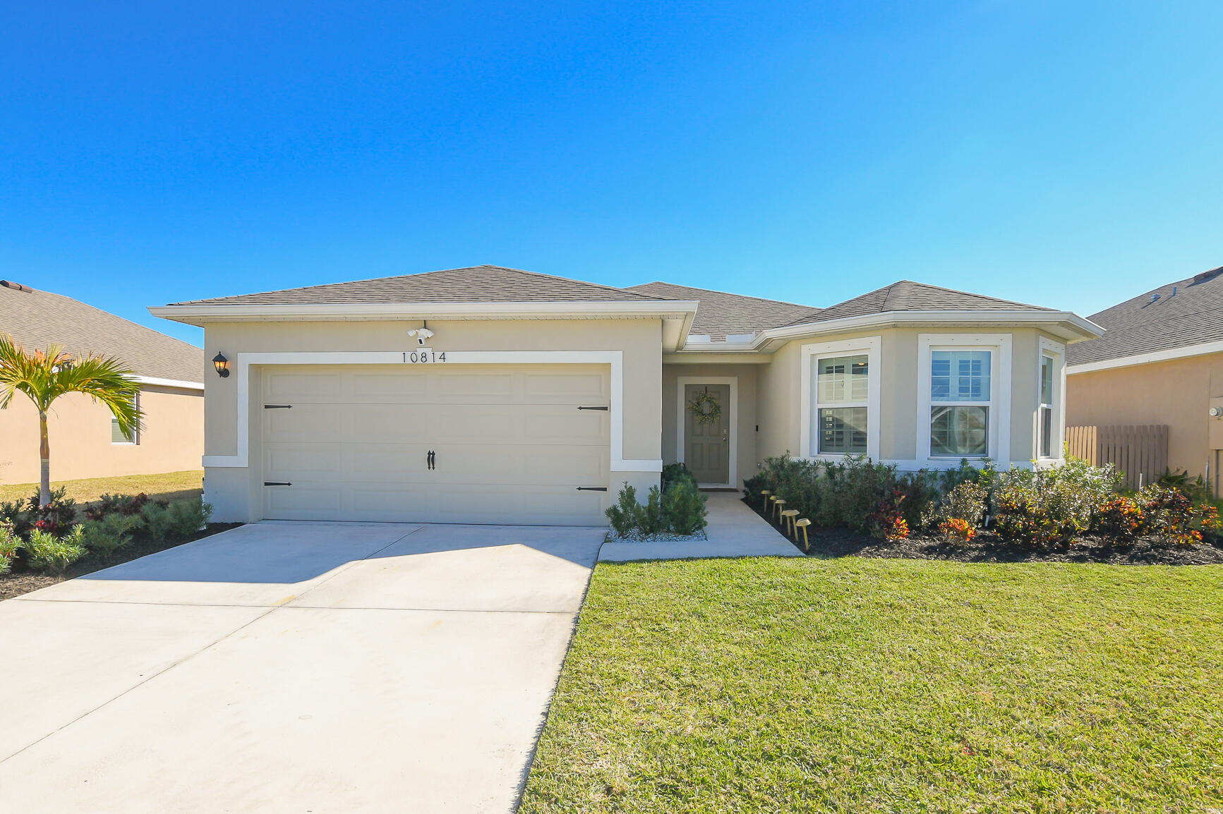 Owner req's 24 hour notice. Fabulous ''Eastham'' Model at Crosstown Commons in Port St Lucie. Features Beautiful home built by DR Horton w/ CBS Construction, 3 BR's, 2 BA's, 2 Car garage w/ covered patio, extended paver patio & large fenced in yard w/Lake View! Details include volume ceilings, open floor plan, tile in main areas & Plantation Shutters. Large Eat in Kitchen offers white cabinets, granite counter tops, deep sink, pantry & stainless steel appliances. Spacious Great room for living & dining perfect to entertain! Looking for a community that has low HOA fee's only $38.00 per month. HOA fee's includes common areas, recreation center, cable, internet, playground & Pool. Hurricane Shutters included. Large fenced in yard, covered patio & extended patio offering tranquil lake views. Close to shopping, schools, hospital, restaurants & Tradition Square. The Treasure Coast has beautiful waterways for fishing, boating & beaches. Only 45 Minutes to Palm Beach Airport.