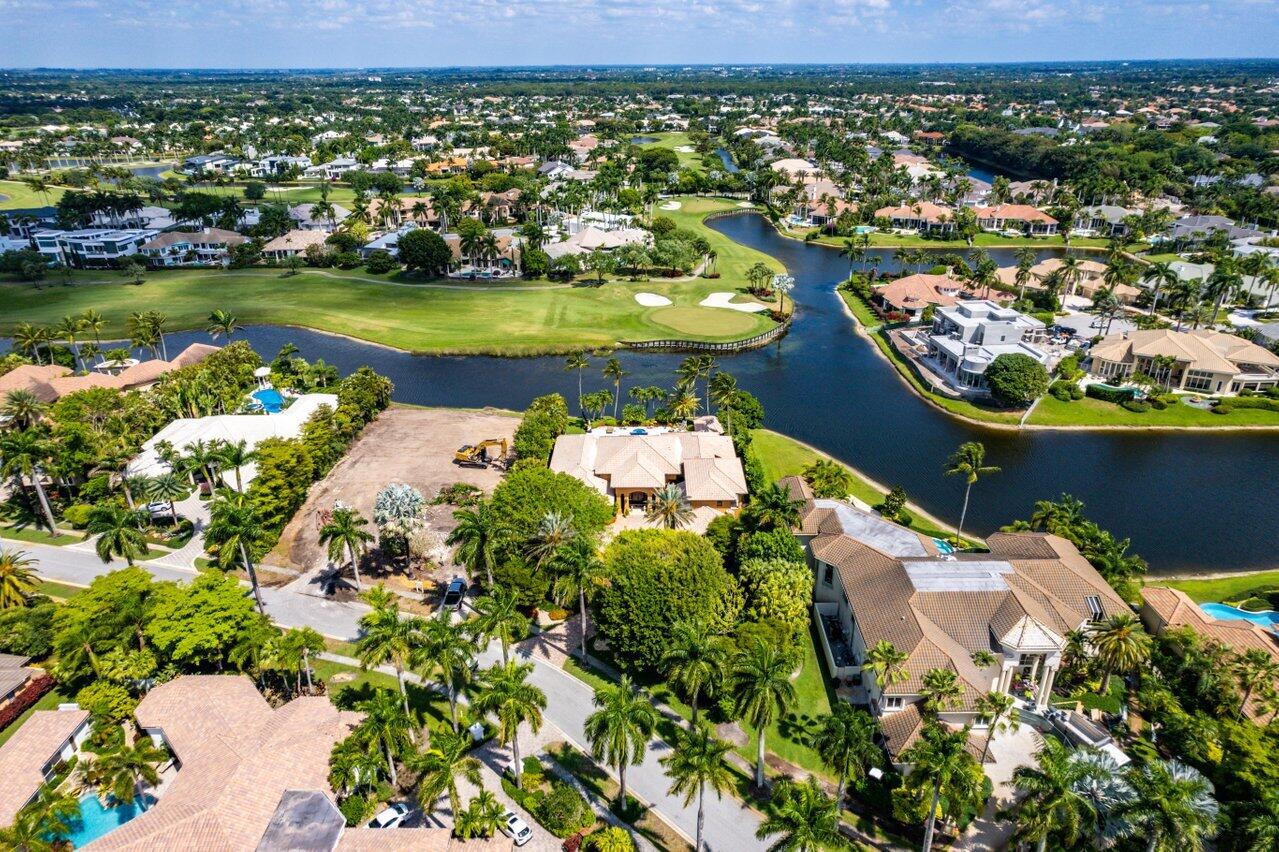 You are going to fall in love with this stunning estate in the prestigious St Andrews Country Club. This is one of the best lots in the community. The deep lot boasts .69 acres and overlooks the water and golf course! The property boasts 7,728 total square feet. A large lot, serene views, beautiful home makes this a fantastic buy. 


Please see supplement link for a full description of this property. As you drive into the estate you will be greeted by a long stone paver driveway surrounded by beautiful trees and landscaping. The back of the property has a fantastic sparkling pool and spa, large pavers, a gazebo with a summer kitchen, lush palm trees, and incredible views. 

As you enter the double doors to the property you will be pleased with the open grand room concept with high ceilings, and beautiful millwork throughout. The home has elegant stone floors, a huge family room and formal living room all overlooking the lake and golf course. The kitchen is well equipped with solid wood cabinetry, granite countertops, wine refrigerator, top of the line stainless steel appliances, and center island with gas range. The house has luxurious window treatments and plantation shutters throughout. All downstairs bedrooms including the primary are light, bright, spacious, and well appointed. The majority of the living space is downstairs, however you do have a private guest quarters upstairs with a living room, balcony, and bedroom with en suite bathroom, and hardwood floors.  The home is in pristine condition and ready for it's next owner. Other custom features include upgraded bathrooms, custom closets, elegant lighting, updated laundry room, sunken bar, office, cabana bath, 2.5 car garage, and so much more. 

Due to the size of the lot and views, it is also ideal for a builder to come in and build a masterpiece. 

Membership to St Andrews Country Club is Mandatory.