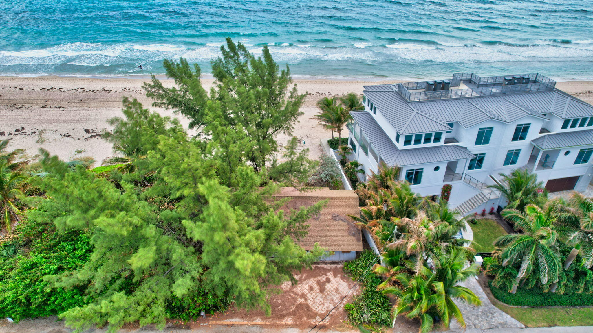 DIRECT OCEAN FRONT - A unique opportunity to renovate current structure, add hard scapes and new landscaping   Current structure is a duplex.  Property zoned multi-family and single family   ''BUILD YOUR DREAM BEACH VILLA ''  STEPS FROM THE GLISTENING ATLANTIC OCEAN -Small town vibe nestled between Downtown Delray Beach and ''Hot Spot'' West Palm Beach/Palm Beach/Manalapan  WORLD CLASS DINING/SHOPPING/THE ARTS  - Rendering available, survey, all research, and appraisal - Most of the trees on property are not protected - current structure approx.1,460 total sq feet.