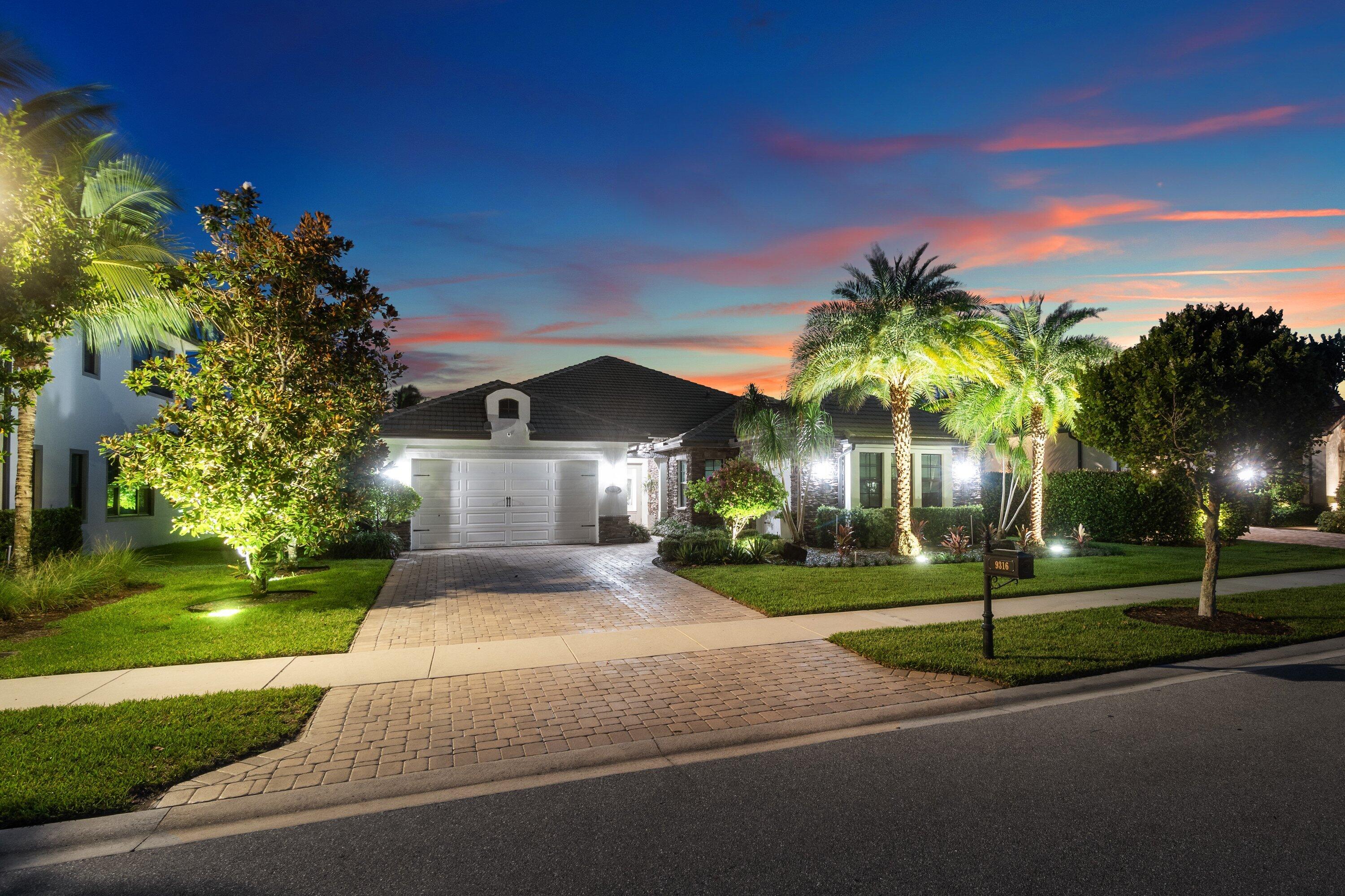 Why wait to build? This stunning 2019 estate home in highly sought-after Palm Meadows Estates is loaded with luxury upgrades and is truly move-in ready.  Enjoy beautiful curb appeal with a brick elevation, professional landscaping, and exterior lighting. The private backyard features a saltwater pool with a raised heated spa, creating the perfect outdoor retreat.  Inside, you'll find 24" x 24" porcelain tile throughout, upgraded lighting and oversized fans, a gourmet kitchen with Cambria quartz countertops, upgraded cabinetry, built-in refrigerator, double ovens, gas cooktop, oversized island, and custom wet bar.  The luxurious primary suite offers private patio access and a spa-like bath with lighted mirrors, rain shower, vessel sinks, and an automatic bidet. Additional features include  upgraded bathrooms, a fully equipped laundry room, and a 7-ton A/C with UV air purification.  No expense was spared—this exceptional home offers all the benefits of new construction without the wait!