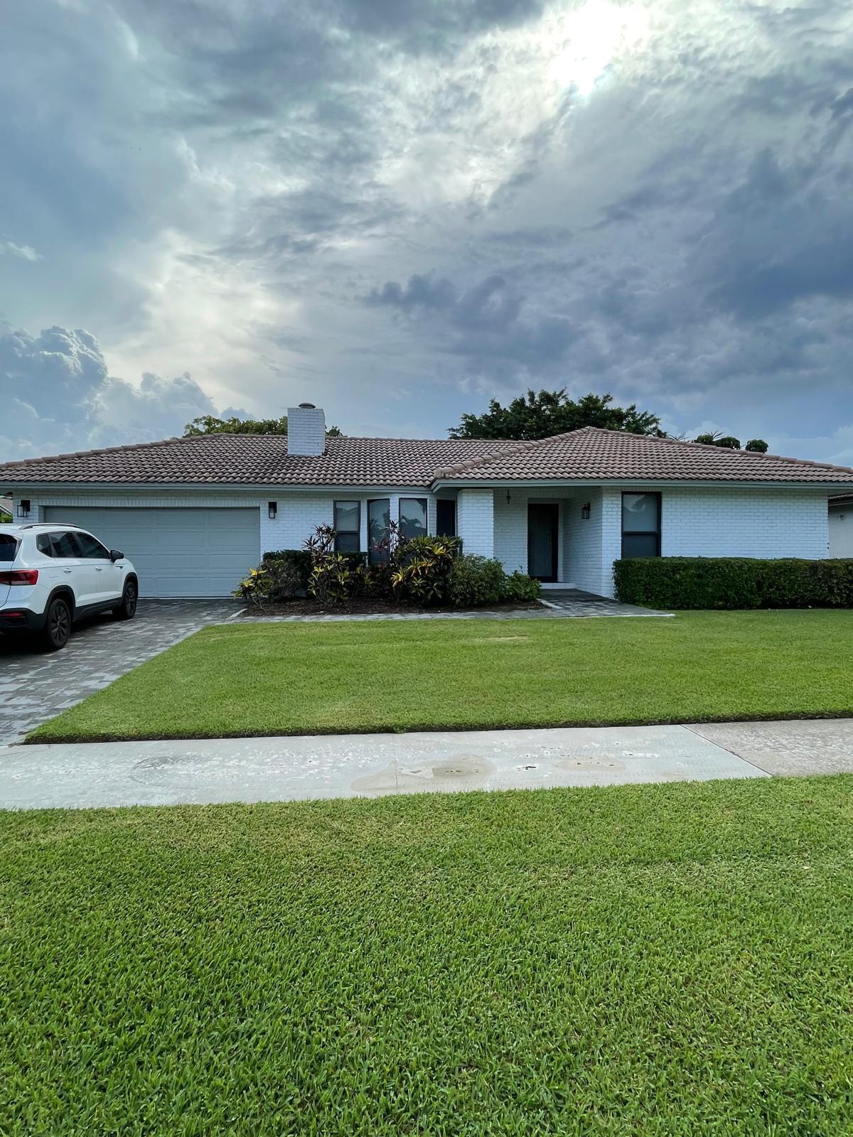 Welcome to this charming single-story residence in Cimarron Sec Two, Boca Raton. This well-proportioned home offers 1,735 square feet of finished living space with three bedrooms and two bathrooms, providing comfortable accommodation for various living arrangements. The practical one-story layout eliminates the need for stairs and offers convenient accessibility throughout the home. The two-car garage provides secure parking and additional storage for vehicles and belongings. This centrally located property presents an excellent opportunity for those seeking a straightforward, functional residence in Boca Raton with A rated schools, shops and restaurants all within minutes..