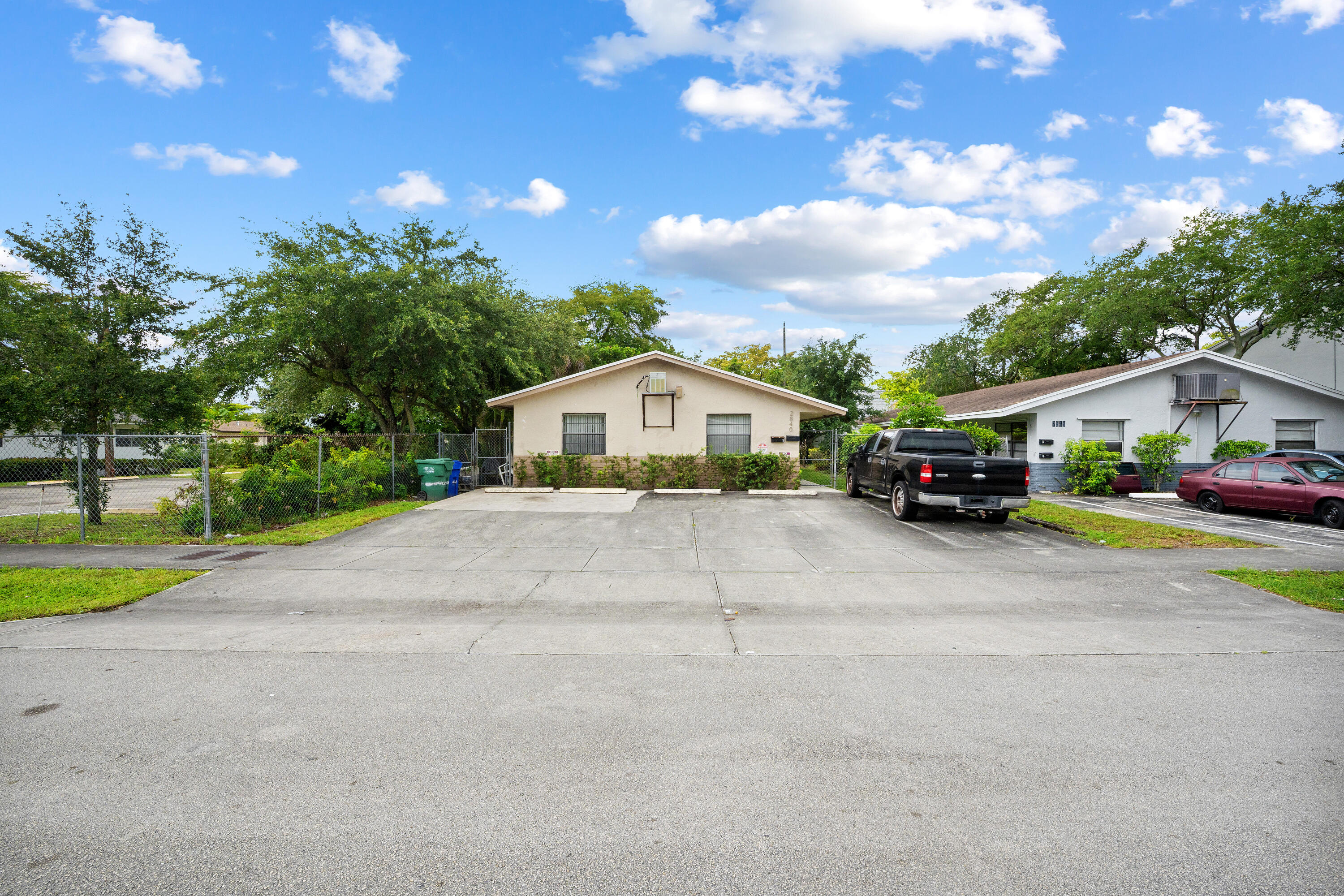 Excellent investment opportunity with this updated duplex featuring two spacious units. The first unit is a 2-bedroom, 1-bath with a lease in place through January 2027, providing immediate rental income. The second unit is a 3-bedroom, 2-bath, offering flexibility for an owner-occupant or additional rental potential. Both units have been tastefully updated with new flooring, modern kitchen cabinets and countertops, and renovated bathrooms. Additional features include central A/C in both units, separate electric and water meters, and a newer roof installed in 2022. A well-maintained property with strong income potential — ideal for investors or owner-occupants alike. Four parking spaces available.