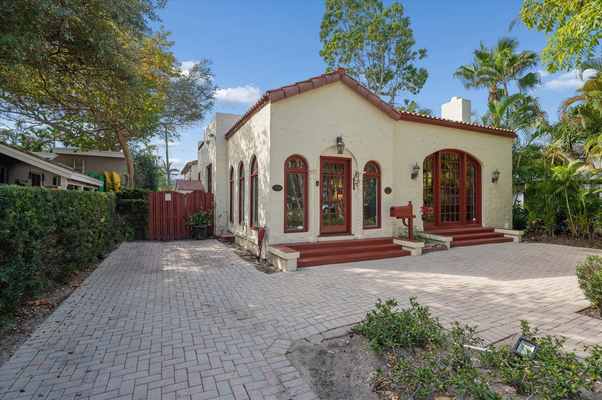 A rare opportunity to own this charming & distinctive  historic 1928 home, rich with character and timeless appeal. This single-story residence features three bedrooms & two bathrooms, blending historic charm with thoughtful modern updates. Inside, you'll find soaring ceilings, beautiful wood flooring, custom closets,  stained glass windows, and a cozy fireplace that create a warm & inviting atmosphere. The home also includes a gas range, tankless water heater, custom-built closets, a jacuzzi tub, and a spacious walk-in shower. Step outside to enjoy exceptional outdoor living with expansive patio areas, a private heated pool, lush tropical landscaping, & ample parking. Ideally located within walking distance to A-rated schools, dining, & shopping, this premier property is truly a must see.