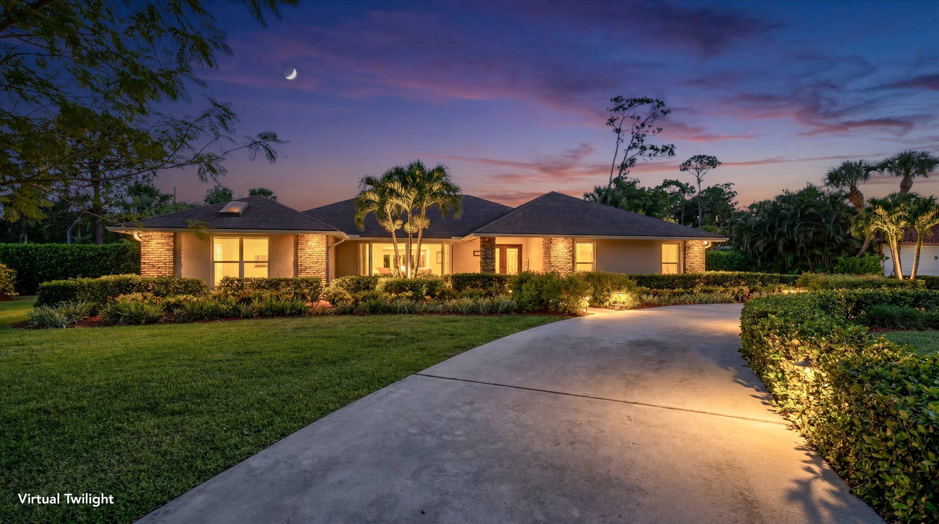 Remarkably renovated and situated on a sprawling 1-acre lot in the highly sought-after Pinewood community, this exceptional home offers the perfect blend of comfort, style, and functionality. Featuring 4 bedrooms plus an office, 3 bathrooms, and approximately 3,200 square feet of open living space, the home showcases porcelain tile flooring throughout the main living areas.  From the moment you arrive at the circular driveway and step through the front doors, you'll be impressed by the home's bright, open layout and abundance of natural light. Beyond its inviting design, the property is thoughtfully equipped for energy efficiency with impact windows and doors, as well as blown-in attic insulation. Recent updates provide added peace of mind, including exterior paint completed in 2023,  interior paint in 2026, and both the air-conditioning system and water heater replaced in 2023.  Inside, you'll find beautifully renovated marble bathrooms, two primary bedroom suites, and a refreshed kitchen designed for both everyday living and entertaining.  Step outside to discover a truly magical backyard retreat. The impressive 15' x 35' pool was resurfaced in 2022 and serves as the centerpiece of the outdoor living space. The covered patio area and a picturesque gazebo provide the perfect settings for relaxing, entertaining, or enjoying the tranquil surroundings.  Over $40,000 has been invested in the lush landscaping, creating a private tropical oasis. The property is adorned with an extraordinary collection of fruit trees, including mango, banana, Spanish plum, lychee, citrus, tamarind, and three varieties of avocado.  Ideally located in the heart of Wellington, this home is just minutes from world-renowned equestrian venues, premier dining, shopping, hospitals, and airports. Offering exceptional value in Pinewood, this is a rare opportunity you won't want to miss.