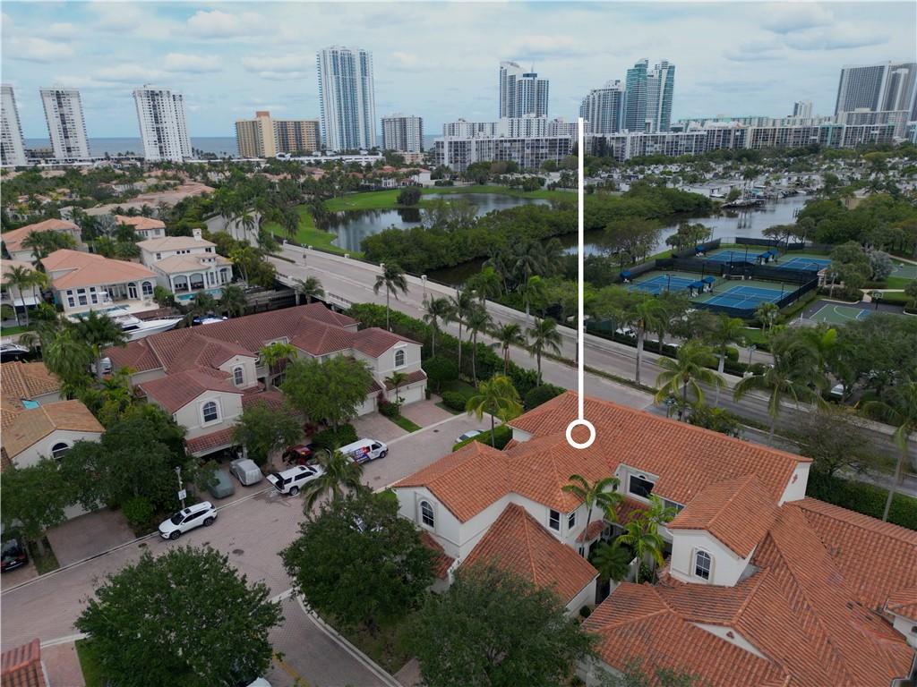 Welcome to your new home in the prestigious Harbor Islands! This stunning 3 bed 3 bath townhome boasts over 2,400 square feet of luxury living space and is equipped with top-of-the-line features that make it a modern oasis. The home is equipped with impact windows and smart home features allow you to control your home with ease, while the Lutron lighting system adds a touch of luxury and ambiance to any room. The townhome has been meticulously maintained and is in pristine condition. The open-concept floor plan is perfect for entertaining and the yard is an oasis for outdoor living. The home is located in a gated community, ensuring your privacy and safety. The community offers a state-of-the-art gym, refreshing pool, and tennis. Convenient to I-95 and close to the beach!