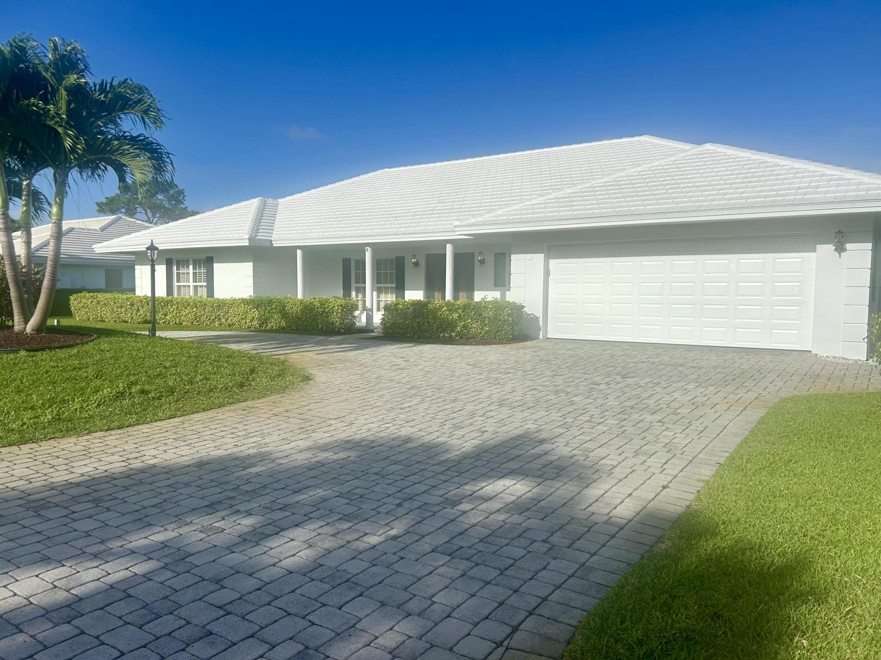 Welcome to an exceptional opportunity in Delray Dunes Golf and Country Club, perfectly positioned on the sixth fairway with serene golf course views. This completely renovated residence has been thoughtfully reimagined from top to bottom, offering the feel of brand-new construction with timeless design and modern luxury.  Every detail has been upgraded, including a brand-new roof, all-new kitchen featuring high-end appliances and designer finishes, beautifully appointed bathrooms, and elegant new flooring throughout. The open-concept layout is centered around a stunning kitchen with a spacious island—perfect for entertaining and everyday living.  Step outside to your private oasis, complete with a sparkling pool and relaxing spa, all overlooking the lush fairway.  Whether enjoying quiet mornings or hosting guests, this home delivers the ultimate South Florida lifestyle.  Move-in ready and impeccably finished, this is golf course living at its finest.