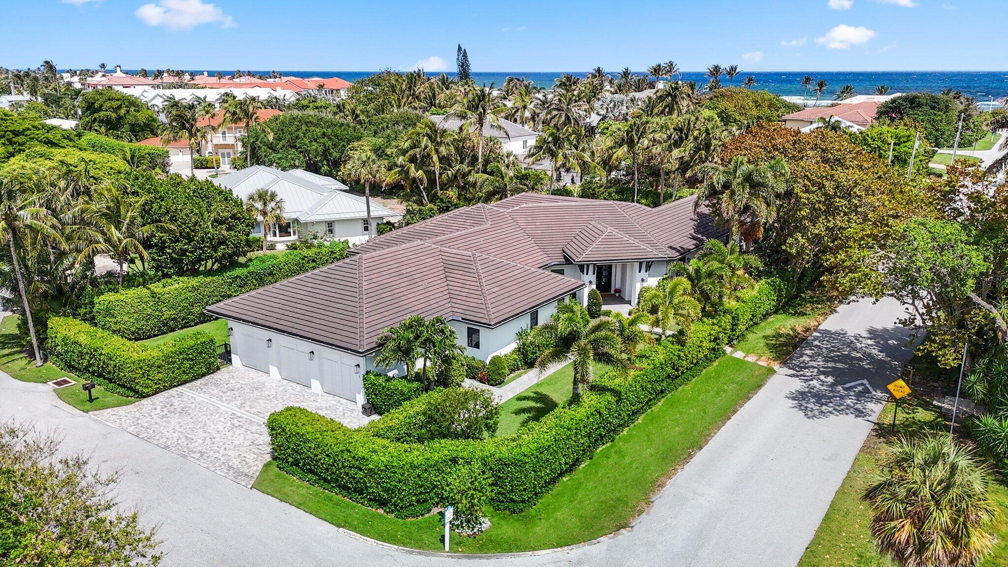 Coastal modern estate home in rarely available beachside enclave. East of A1A with deeded beach access. Totally new and completely renovated in 2020 the  home exudes casual elegance. The single story residence is situated on 1/2+ acre corner lot with over 6,500 square feet of living space. Spacious, open, airy and bright with 5 Bedrooms, 5.1 Baths, no detail has been overlooked.  The enormous Primary Suite has 2 walk-in closets plus custom European built-ins for even more storage, all leading to a bath that provides a true sanctuary.  The chef's kitchen opens onto great room for endless entertaining opportunities. Butler's pantry, separate office/library, huge laundry room with 2 full size washers and dryers, separate mud room, a recreation room that that is only limited by your imagination, a complete outdoor kitchen, and a 3 car garage. All this just yards away from one of the quietest and most beautiful beaches in Palm Beach County.  Ocean Ridge is a residential town nestled between the Intracoastal and ocean, a short distance to Delray Beach and Palm Beach.

Features:
New In 2020:
*Cement tile Roof
*Windows and Doors (all top rated hurricane impact)
*Electric
*Plumbing
*Salt water heated Pool with sun shelf
*Porcelain Pool deck/patio
*Septic
*Irrigation
*Landscape 
*Landscape lighting
*3 car garage - plus AC storage room
*Porcelain flooring throughout
*Dolomite waterfall island, counter & backsplash
*Thermador appliances, gas range
*Large laundry room - 2 full size washers & dryers
*Large mud room 
*Playroom/recreation room
*Office/Library
*Outdoor Kitchen