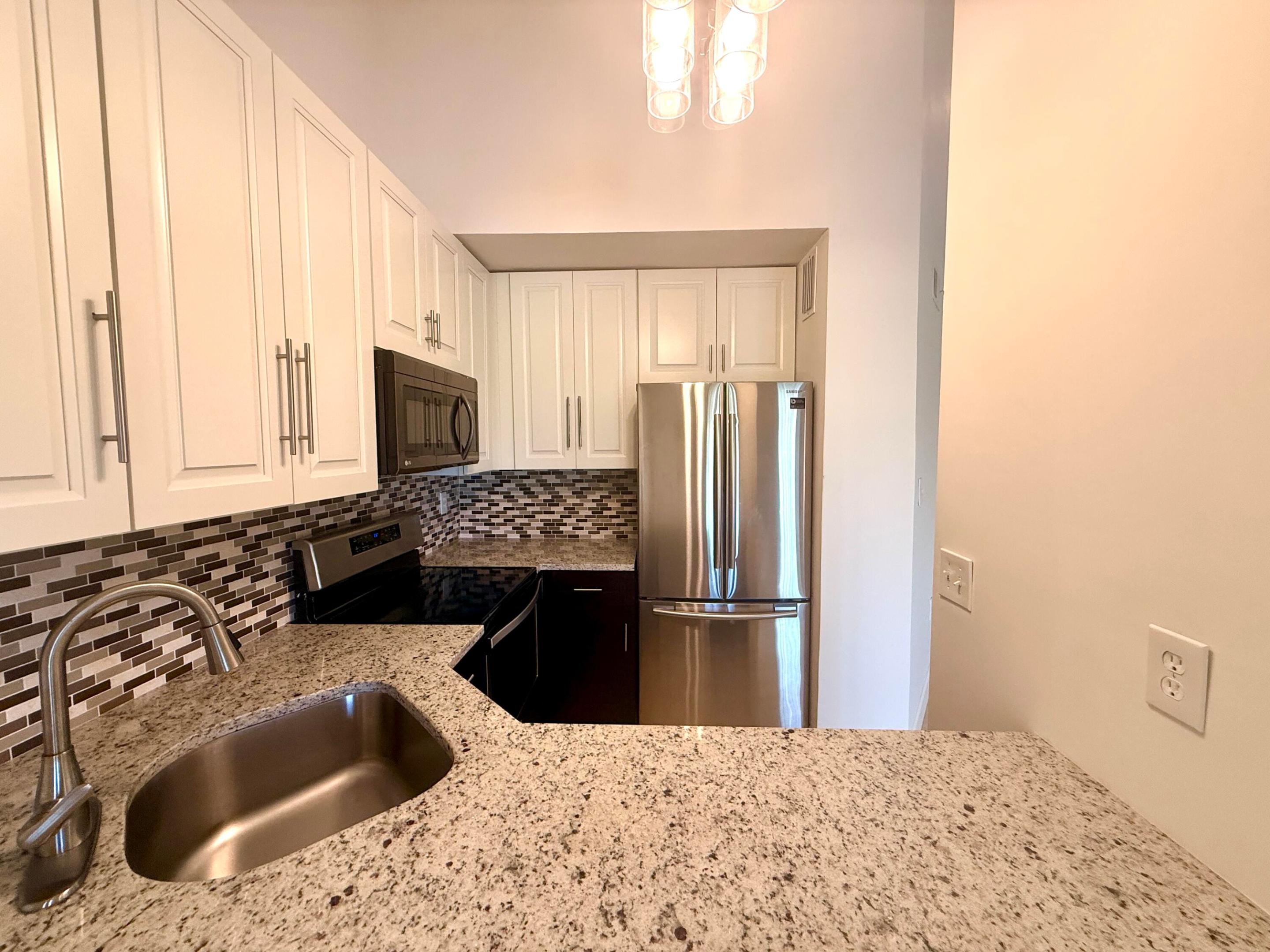 STERLING VILLAGES OF PALM BEACH LAKES CONDO - Residential